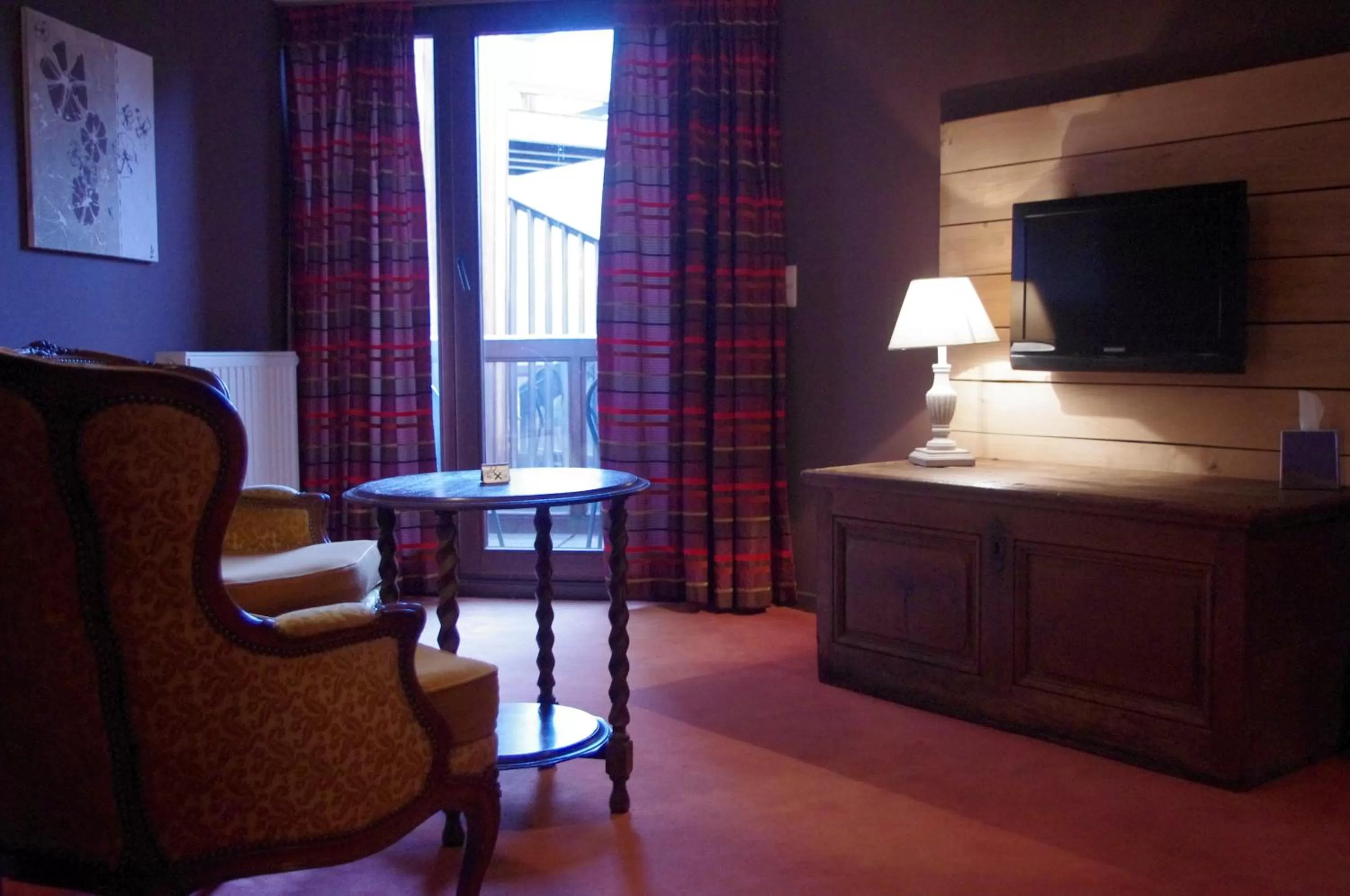 Seating area in Hostellerie La Claire Fontaine, Logis hôtels & Spa