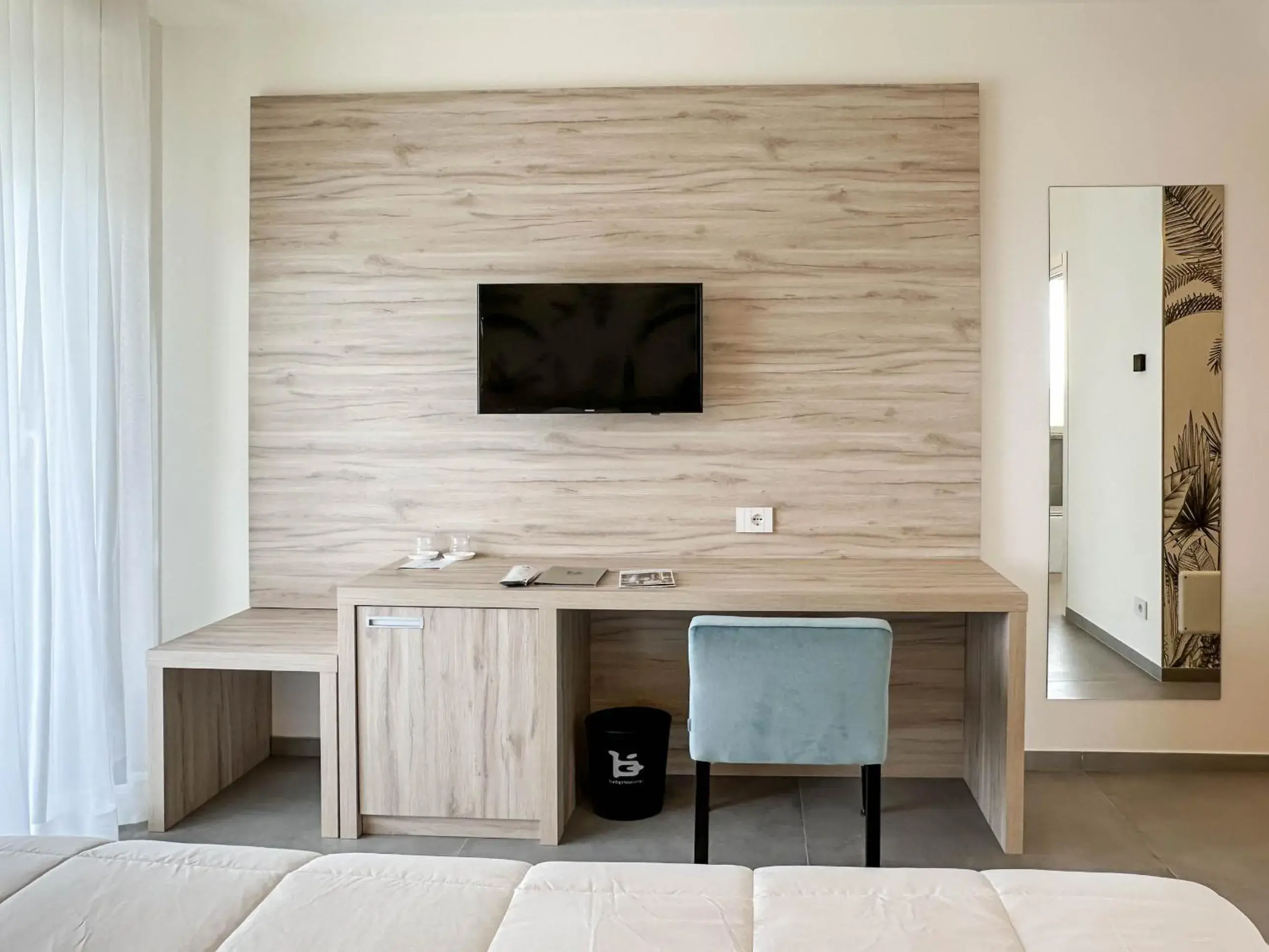 Bedroom, TV/Entertainment Center in Bellettini Hotel