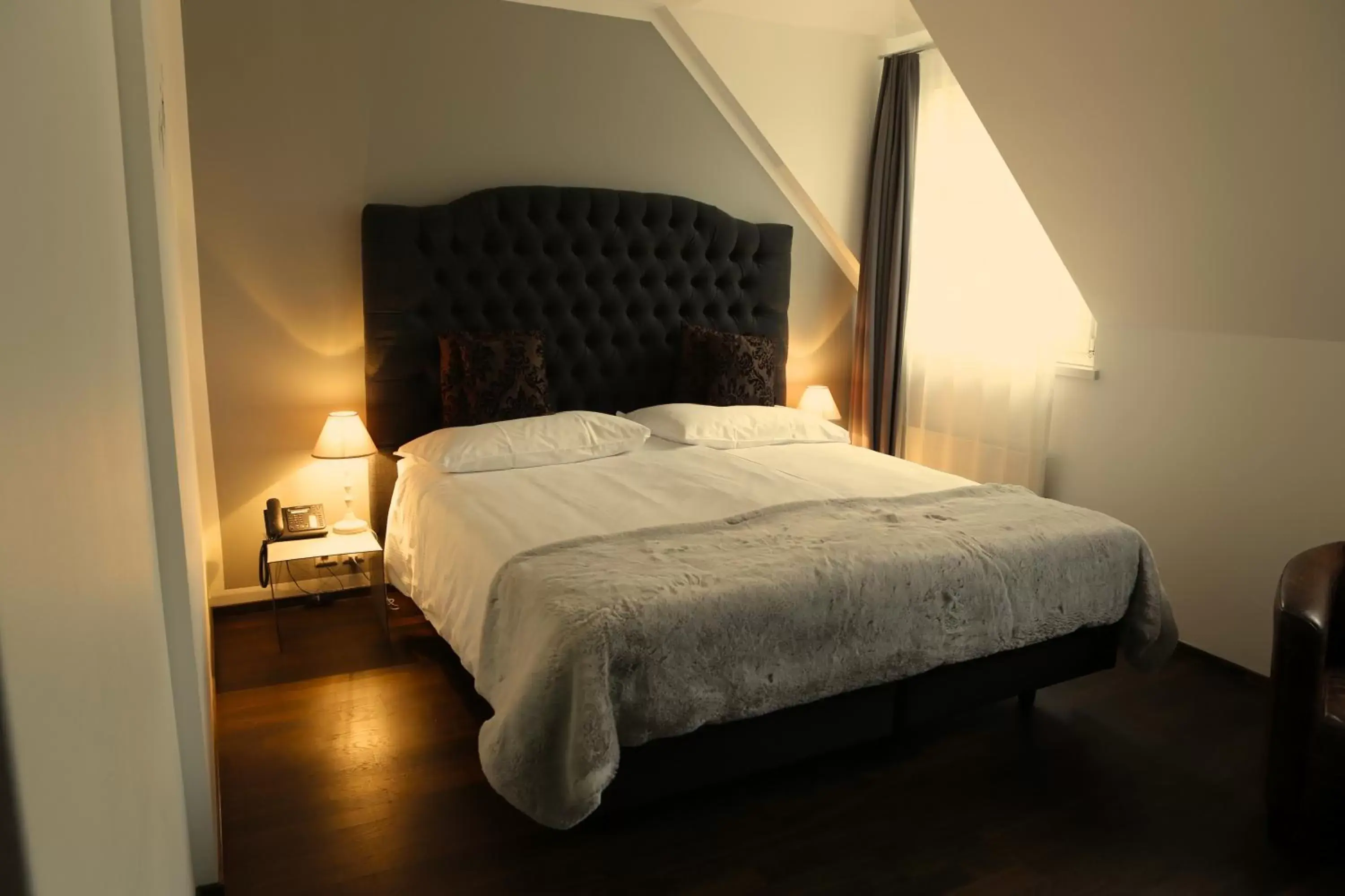 Photo of the whole room, Bed in Boutique Hotel Weisses Kreuz - Adult only Hotel