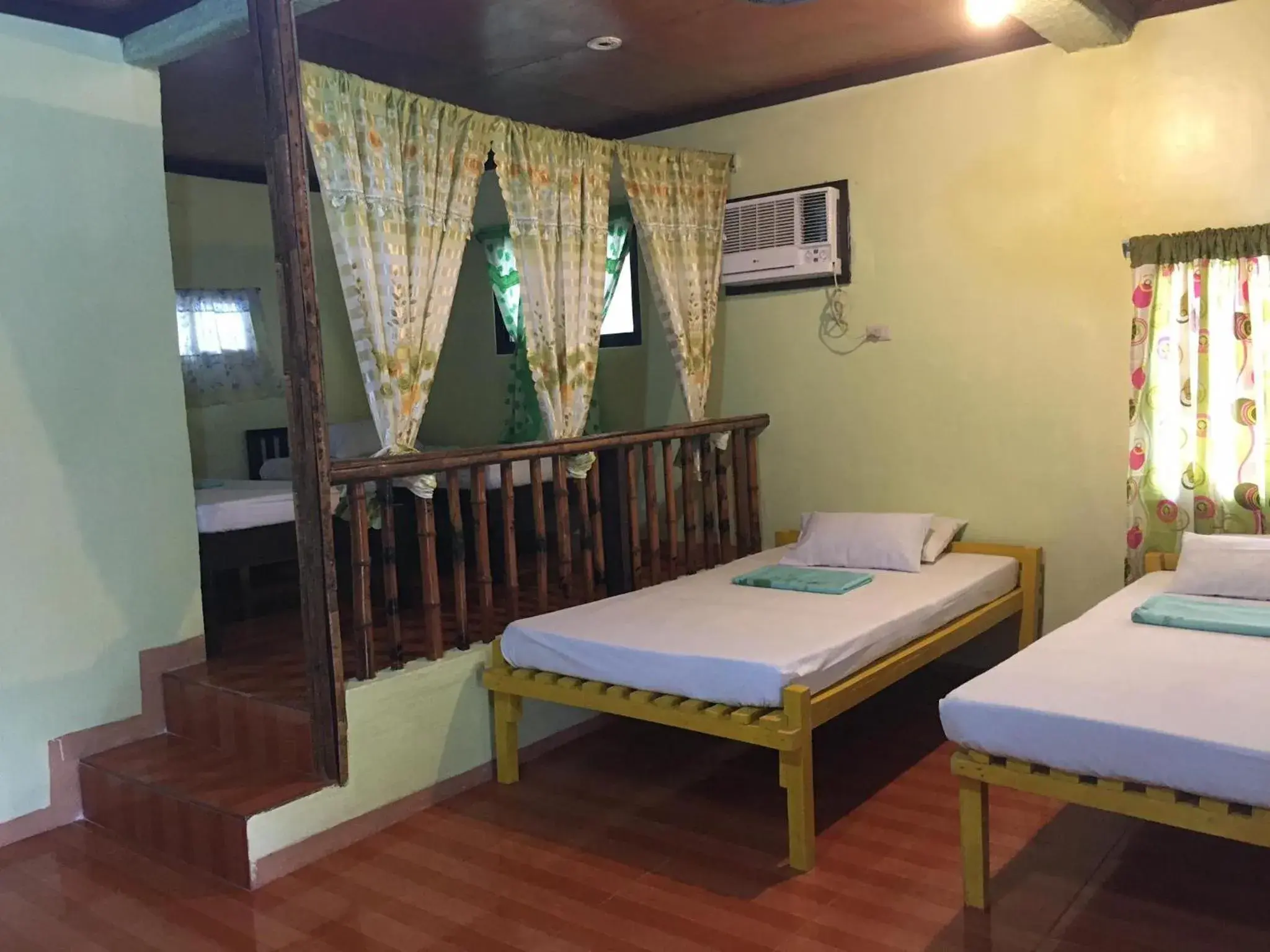 Bed in Bohol Sea Breeze Cottages and Resort