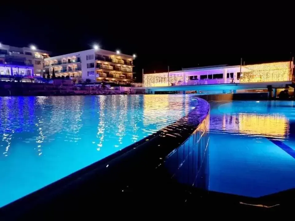 Property building, Swimming Pool in King Evelthon Beach Hotel & Resort
