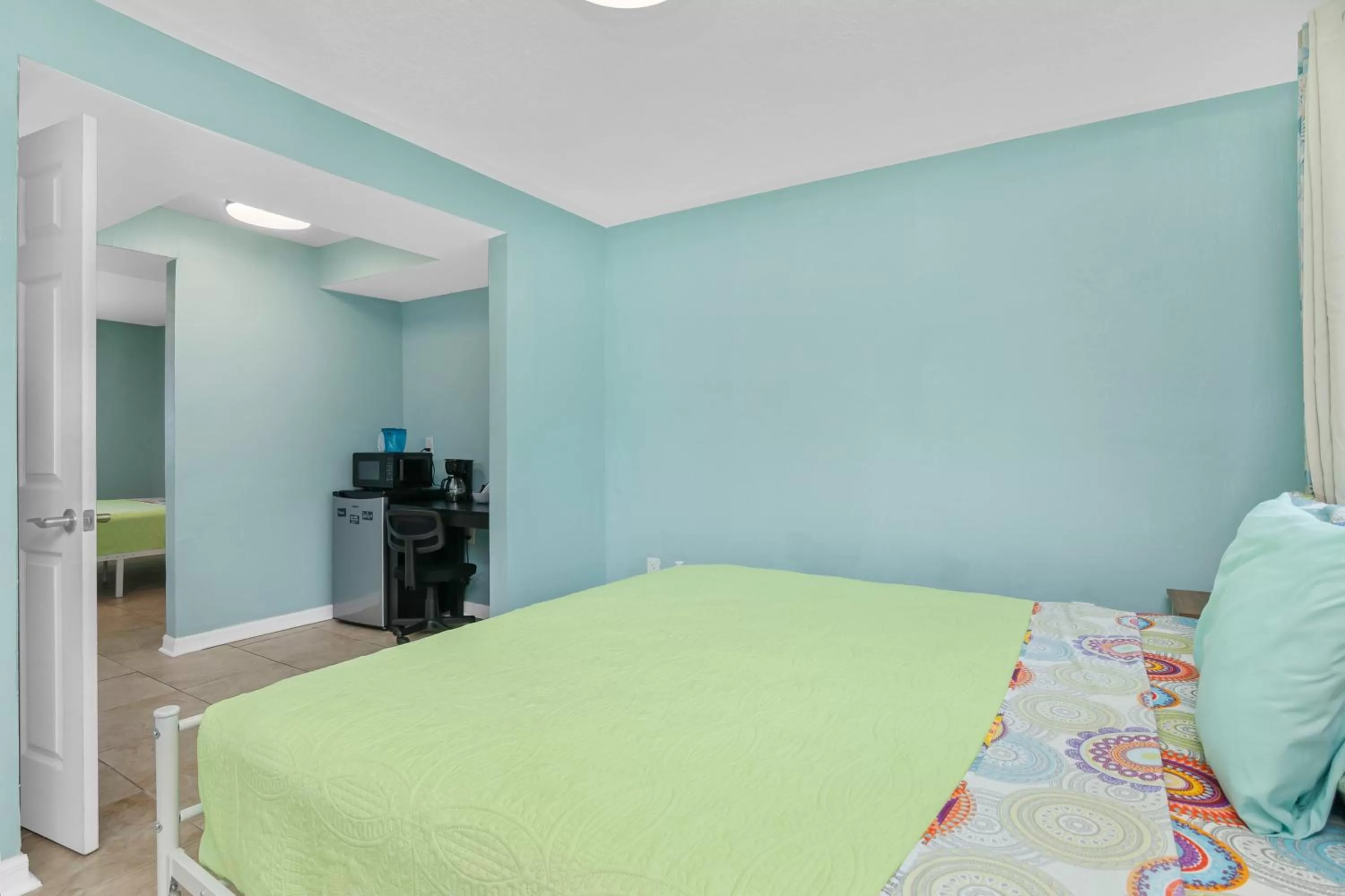 Bed in Latitude 26 Waterfront Resort and Marina