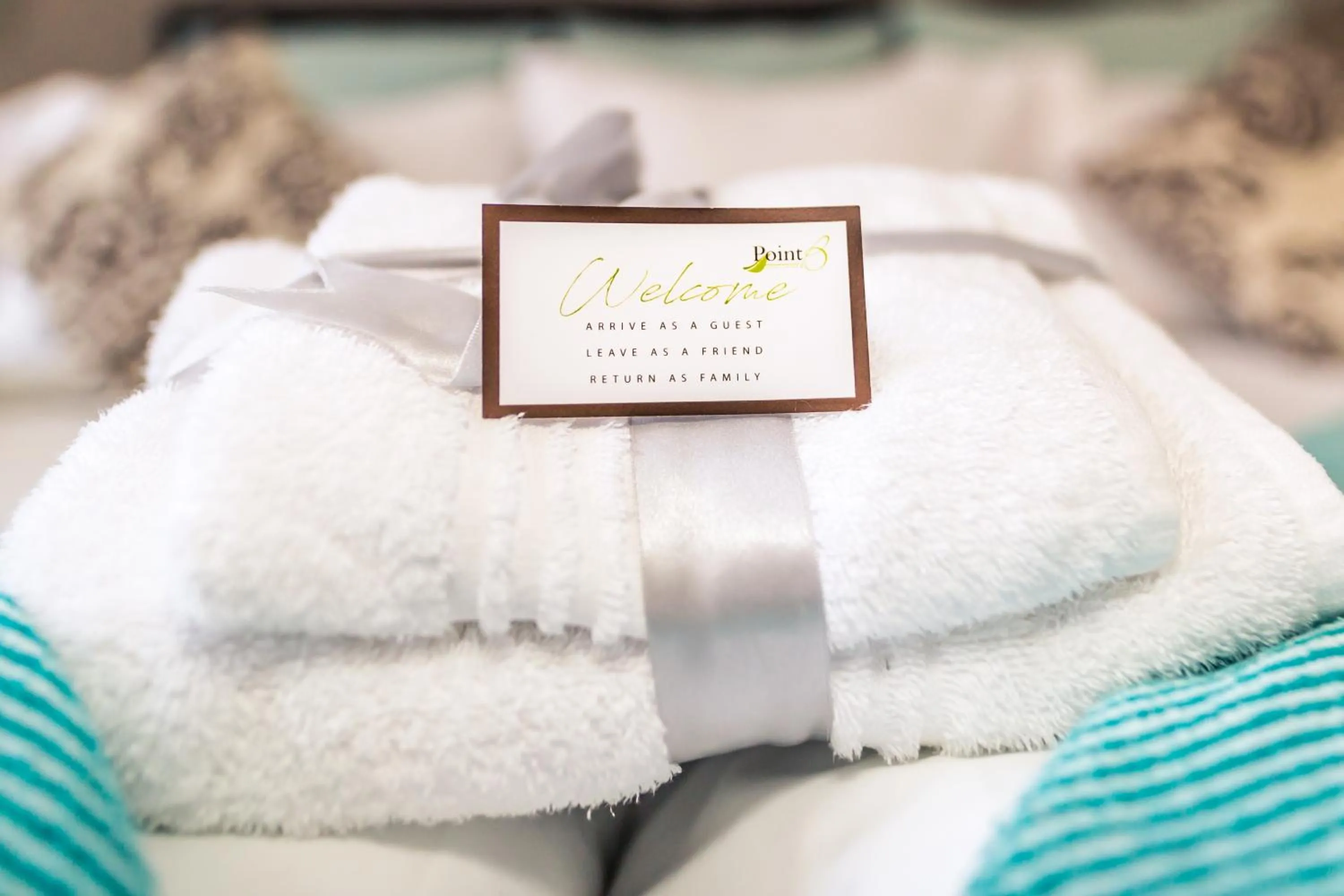 towels, Bed in Point B Guest House -Sustainable Solar Energy