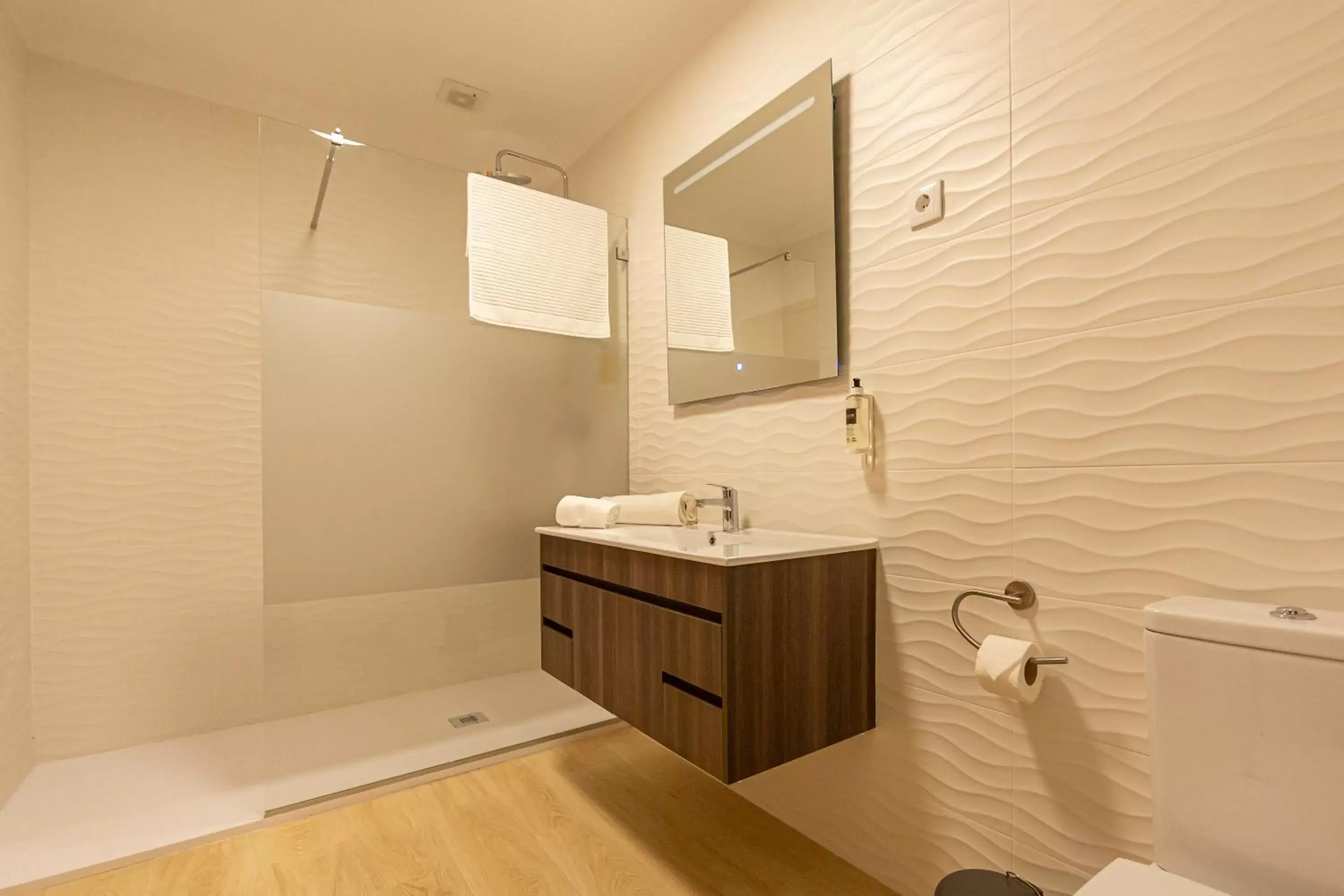 Shower, Bathroom in Luxury Palm Suites