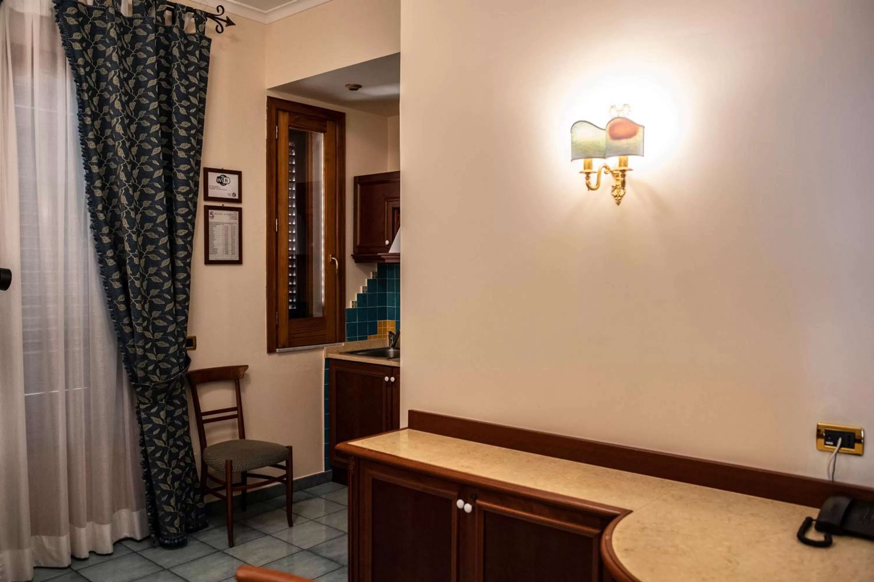 Kitchen or kitchenette in Hotel Garibaldi