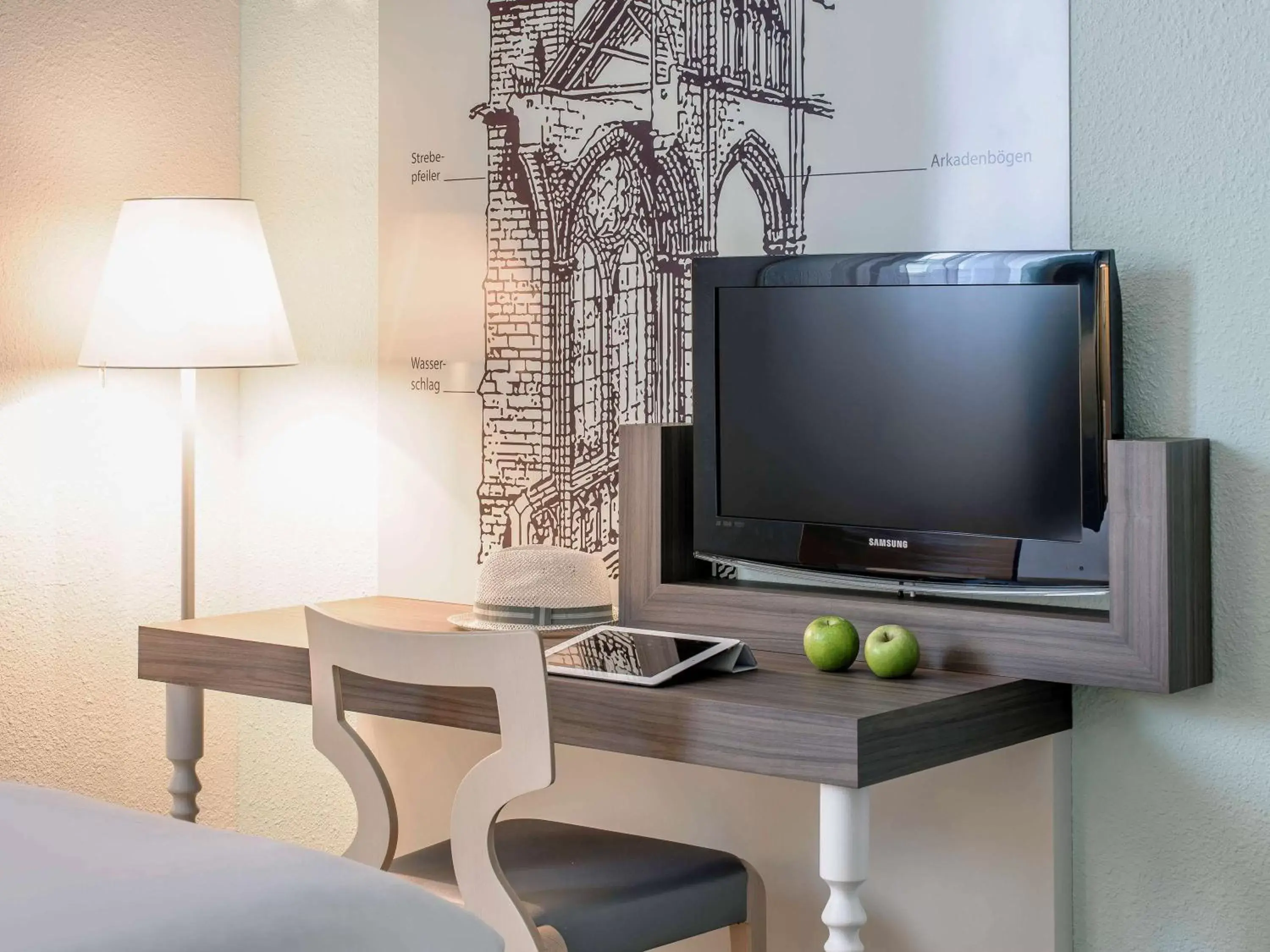 Bedroom, TV/Entertainment Center in ibis Styles Speyer