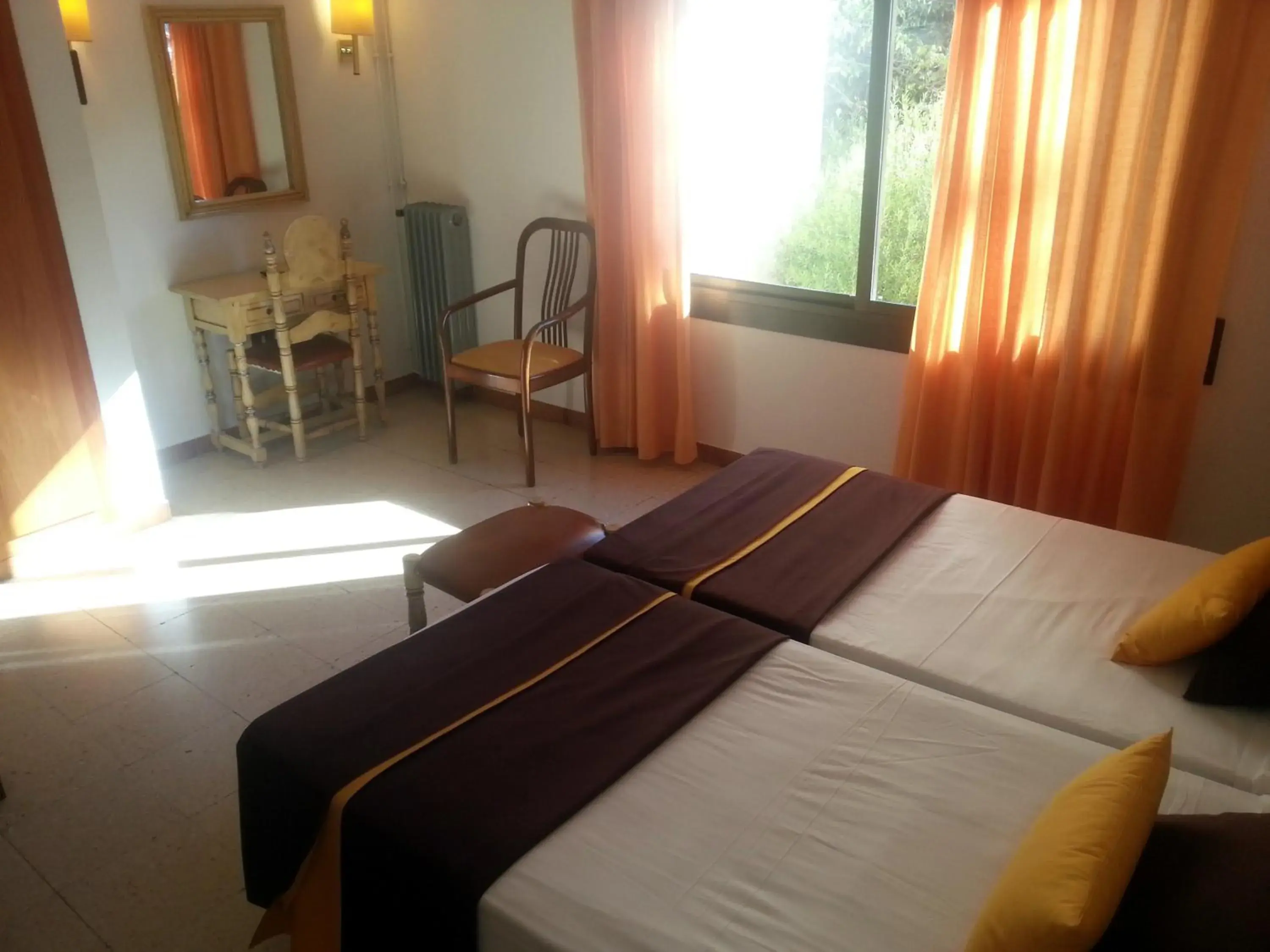 Bedroom, Bed in Hotel Hostal del Sol Bedroom, Bed in Hotel Hostal del Sol