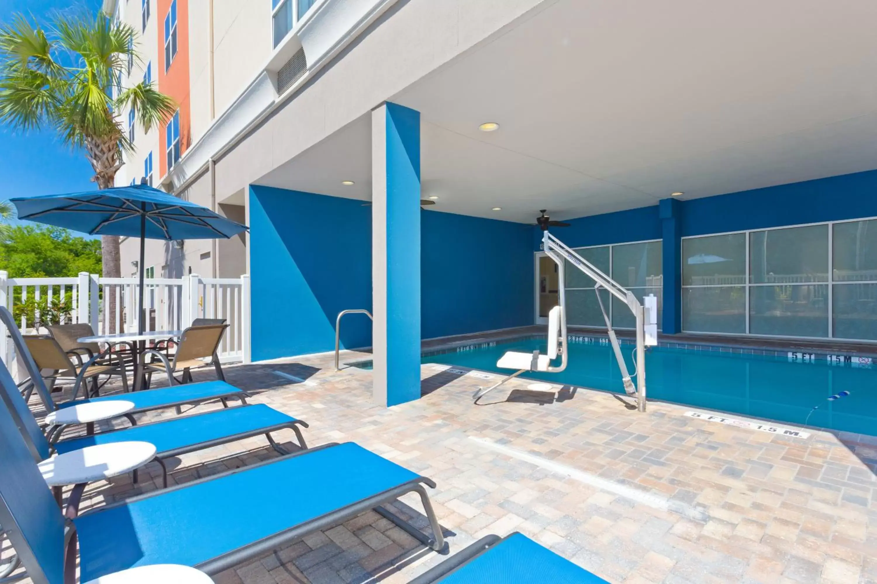 Swimming Pool in Holiday Inn Express & Suites Lakeland North I-4, an IHG Hotel