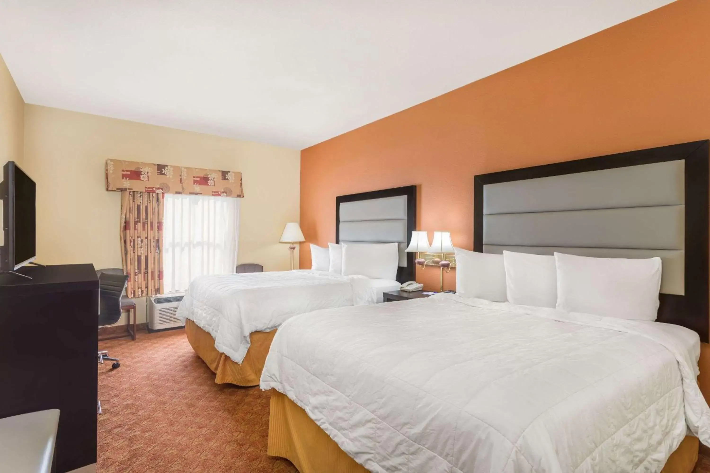 Photo of the whole room, Bed in Baymont by Wyndham Fayetteville