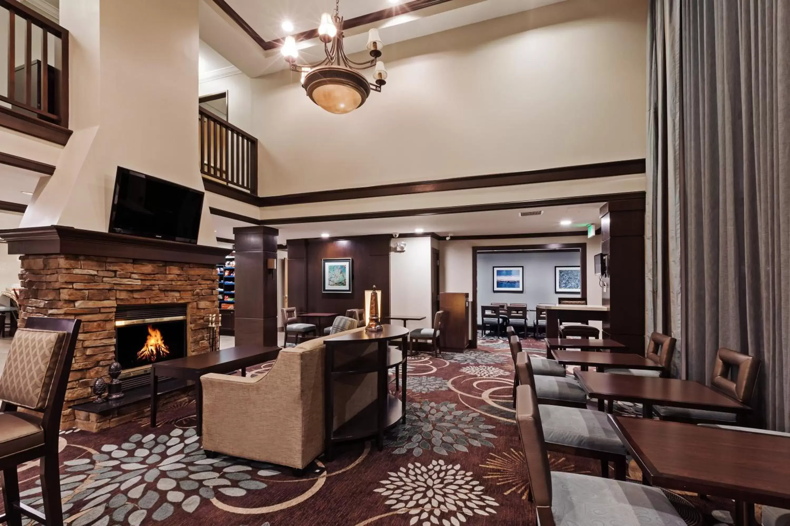 Lobby or reception, Restaurant/Places to Eat in Staybridge Suites Tulsa-Woodland Hills, an IHG Hotel