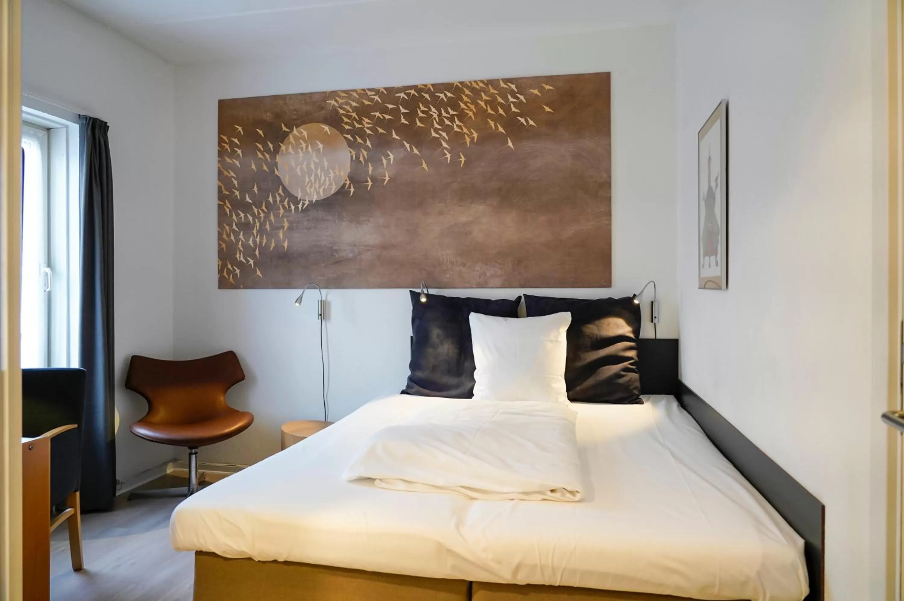 Bed in City Hotel Nattergalen