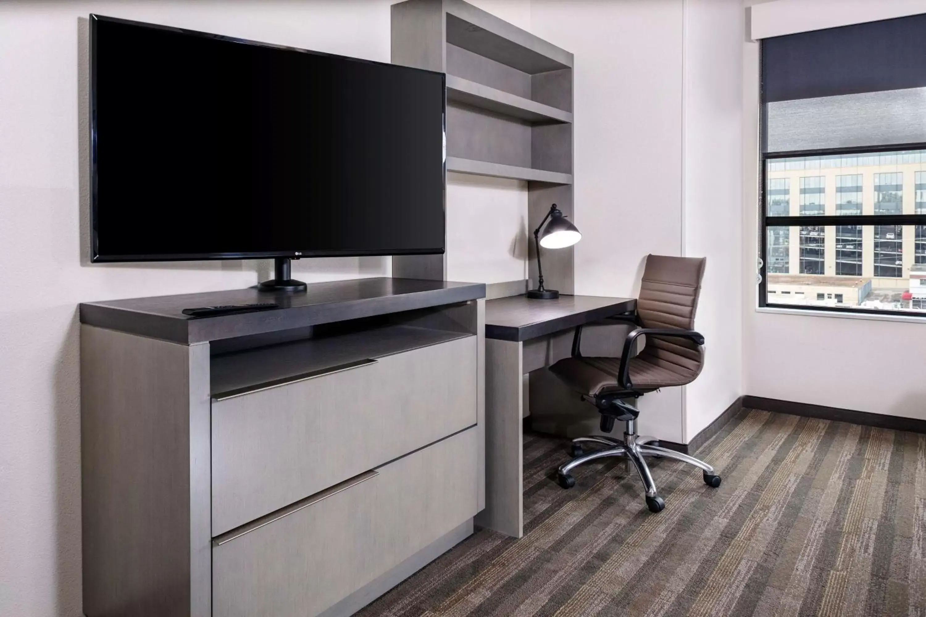 Photo of the whole room, TV/Entertainment Center in Hyatt House Nashville Downtown-Convention Center