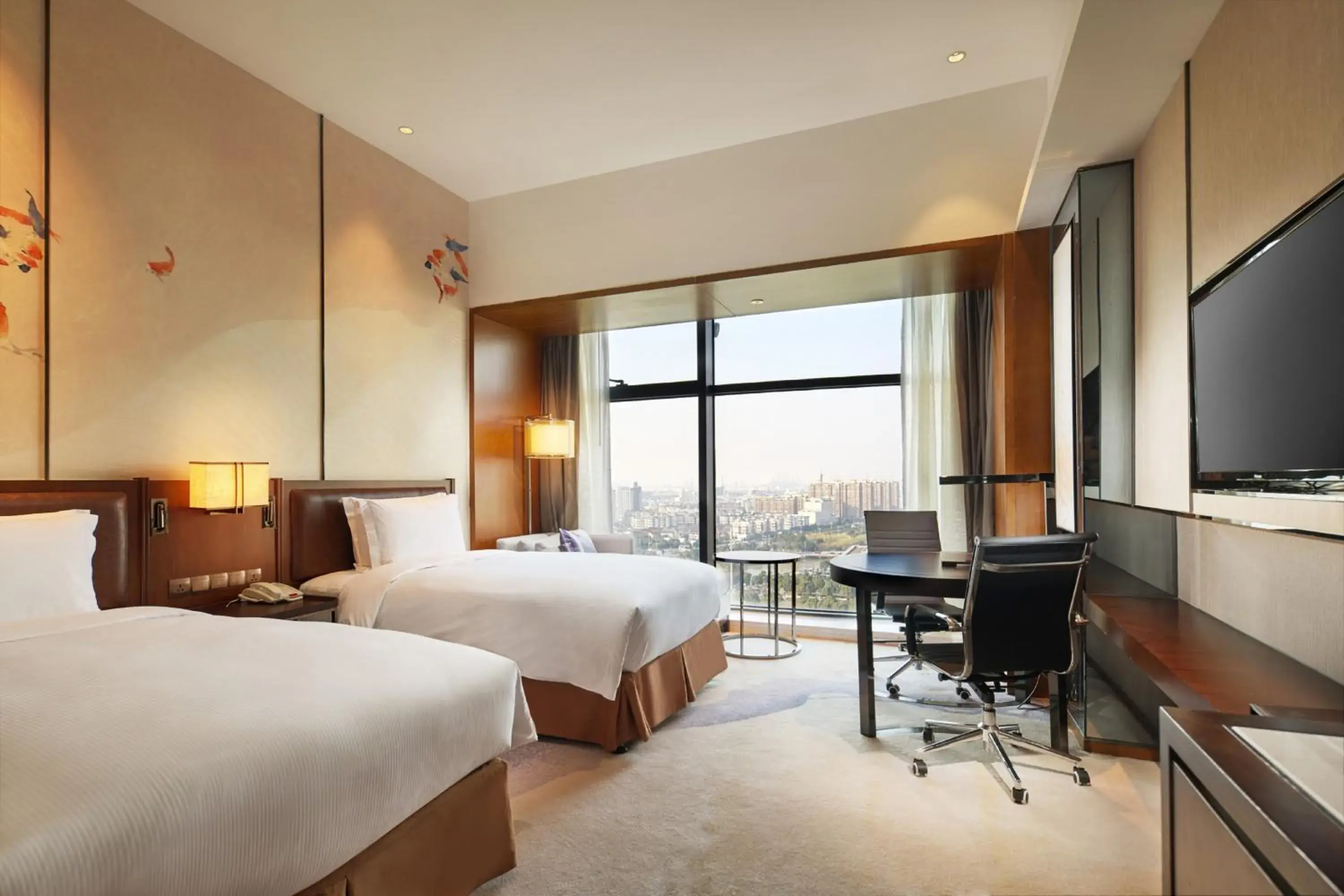 Bed in DoubleTree By Hilton Ningbo Beilun