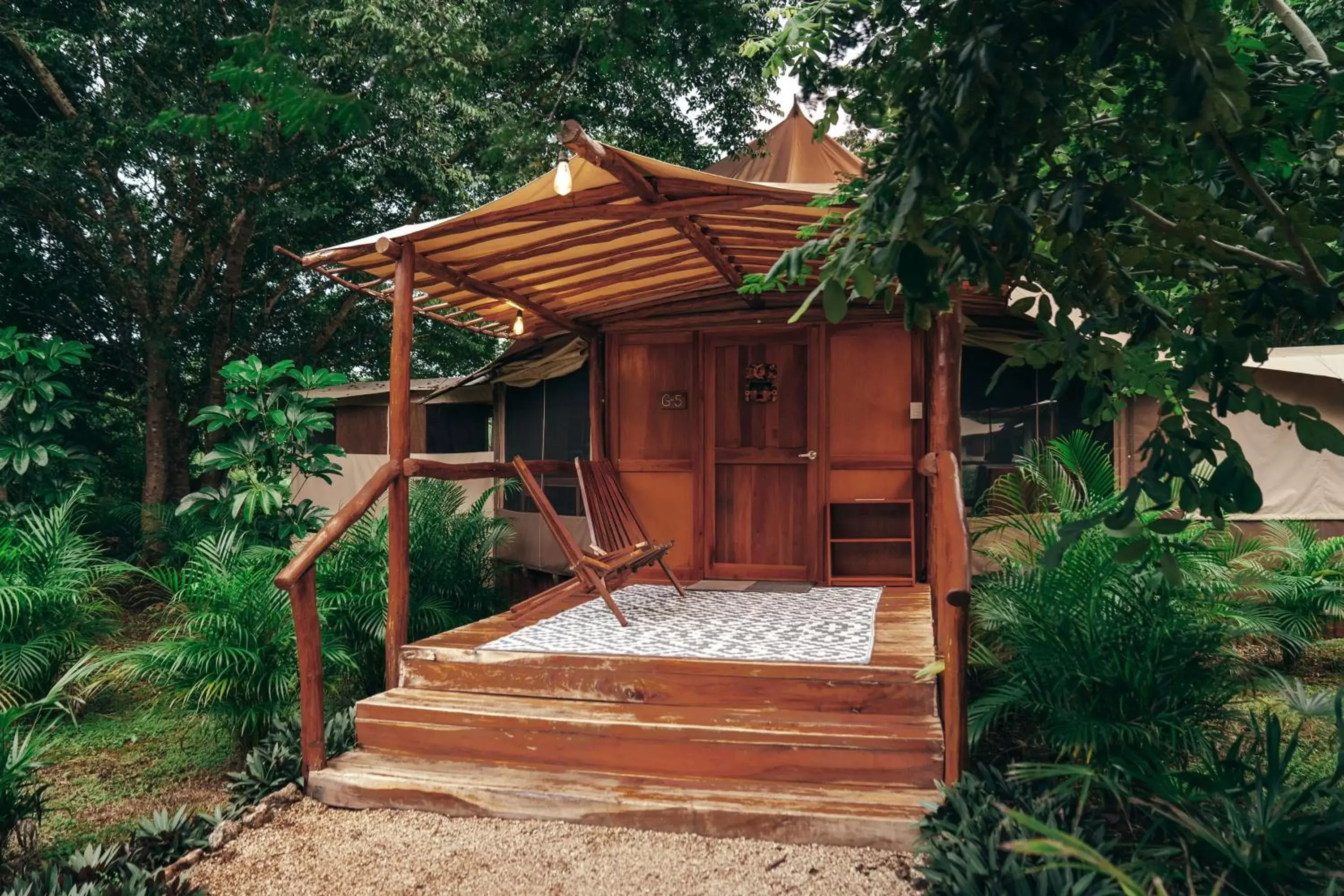 Property building in Destino Mío Mayan Jungle Retreat Property building in Destino Mío Mayan Jungle Retreat