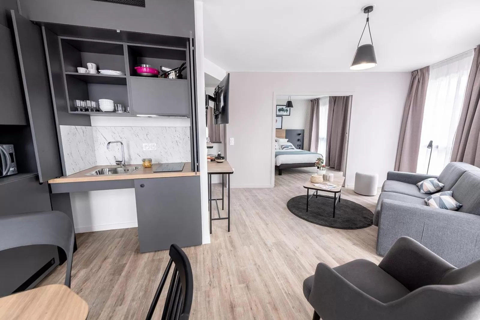 Kitchen or kitchenette in Appart'City Collection Saint Germain en Laye