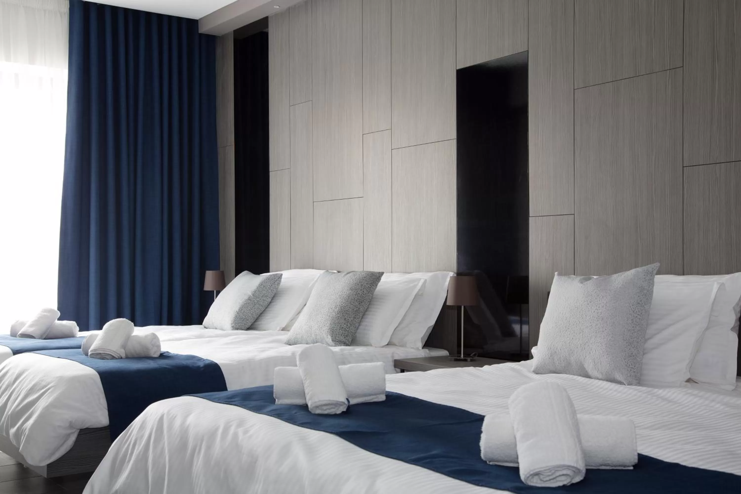 Bed in The District Hotel