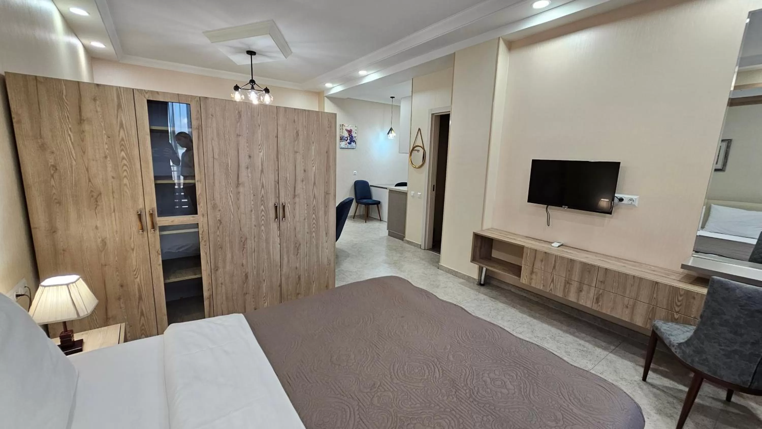 Communal lounge/ TV room, Bed in MD Apart Tbilisi