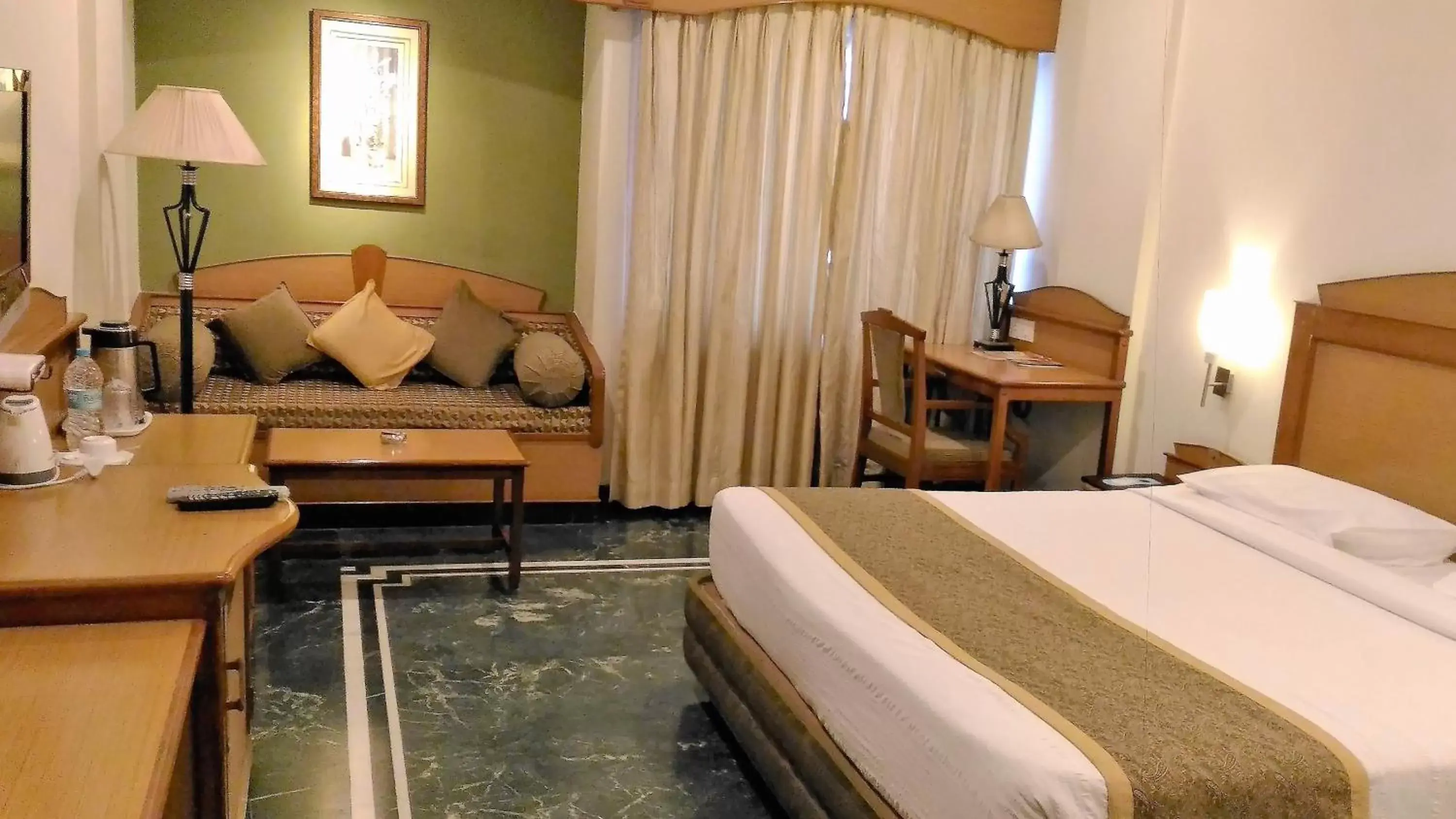 Bed, Room Photo in Taj Tristar