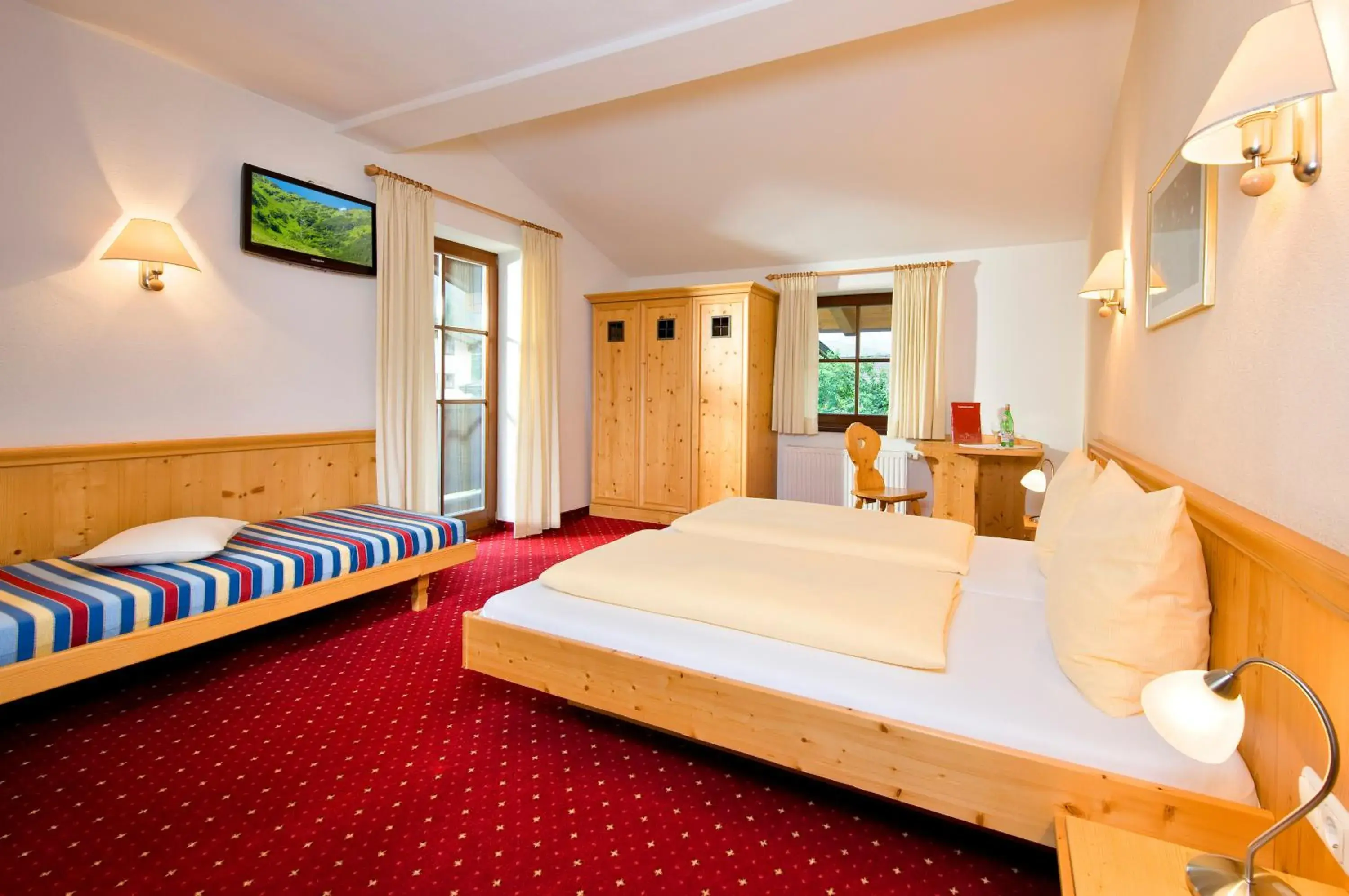 Photo of the whole room, Bed in Hotel Reitlwirt