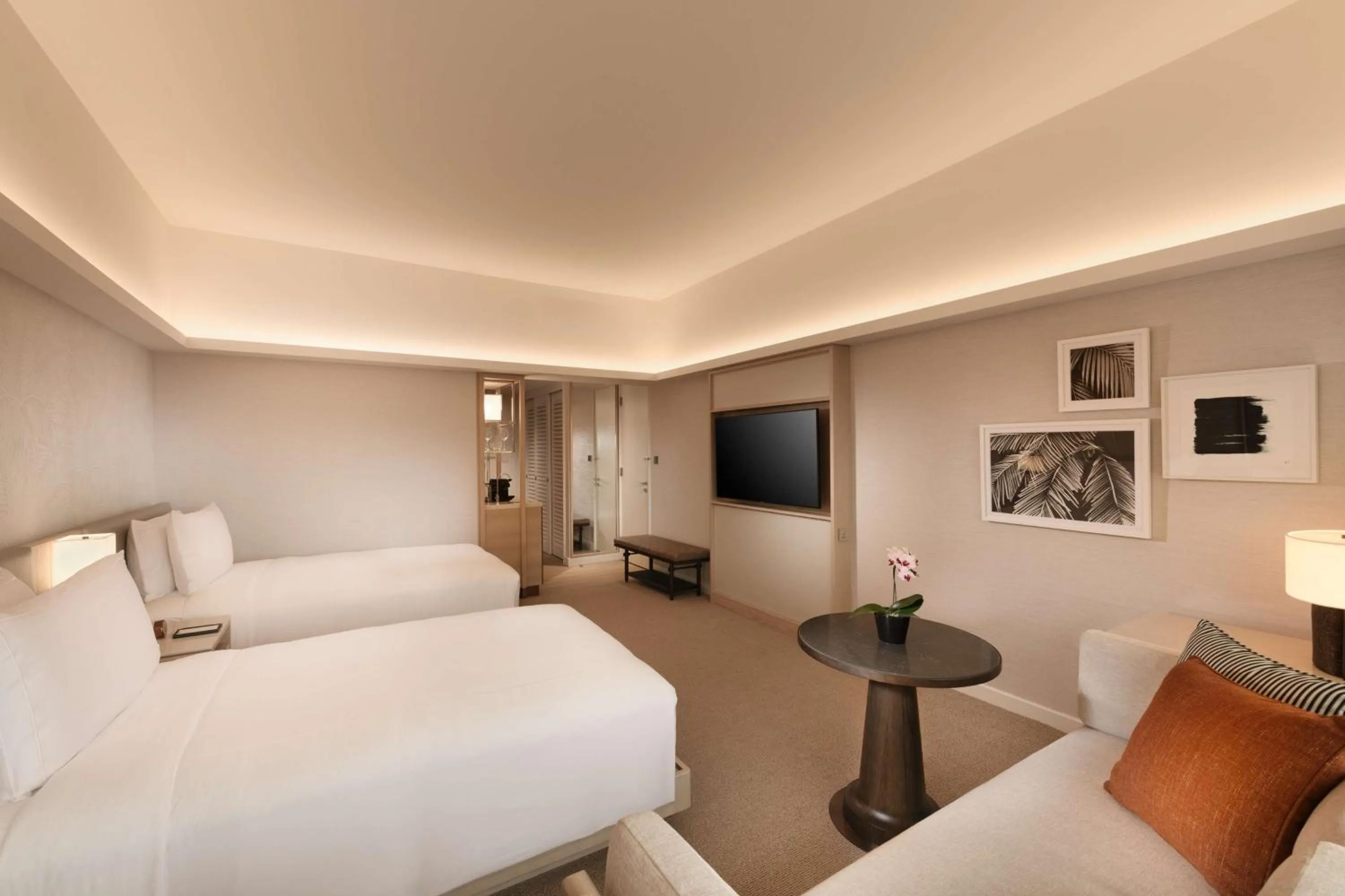 Living room, Bed in Conrad Singapore Orchard