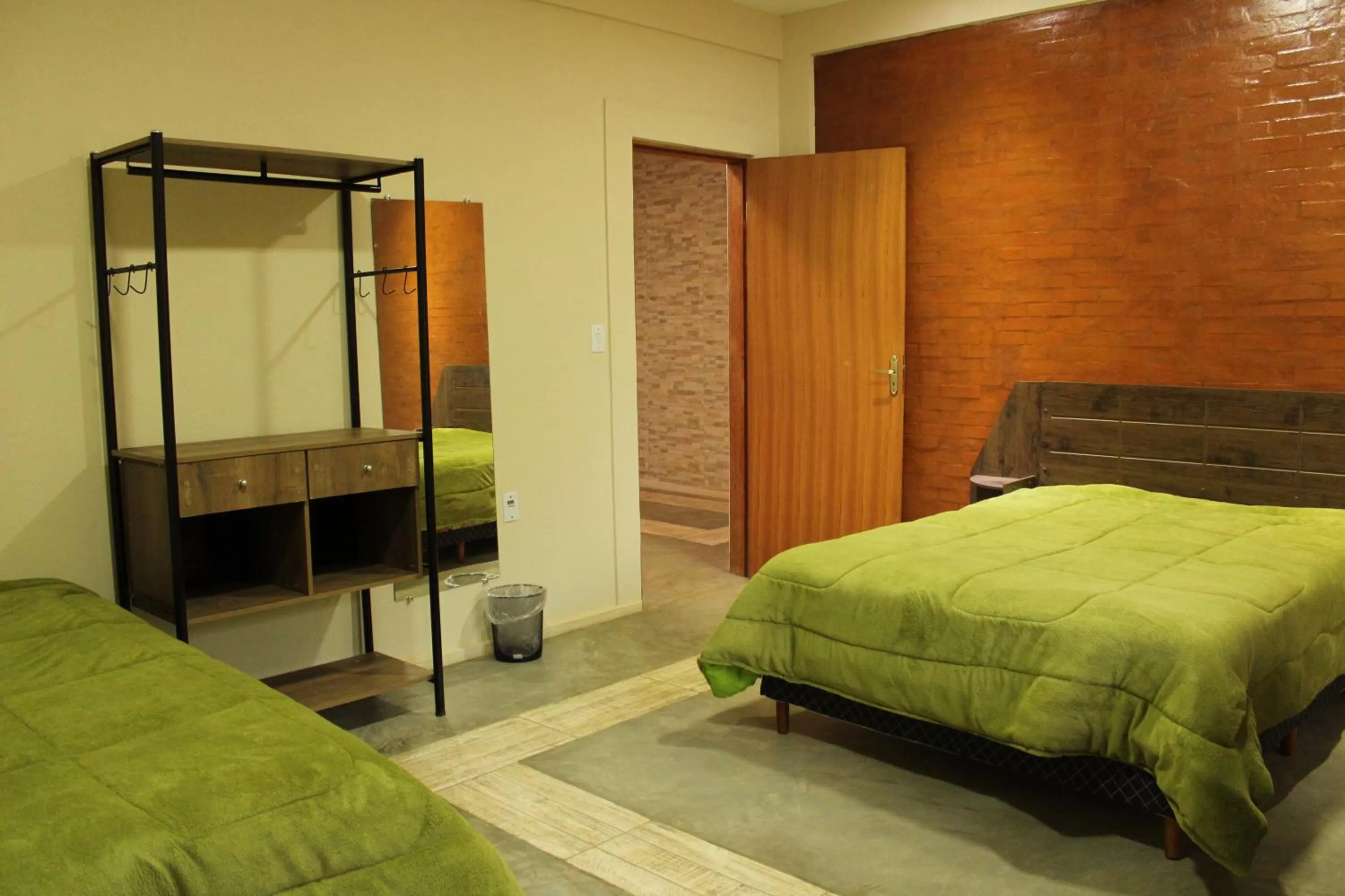 Bed in Pousada Morro dos Ventos