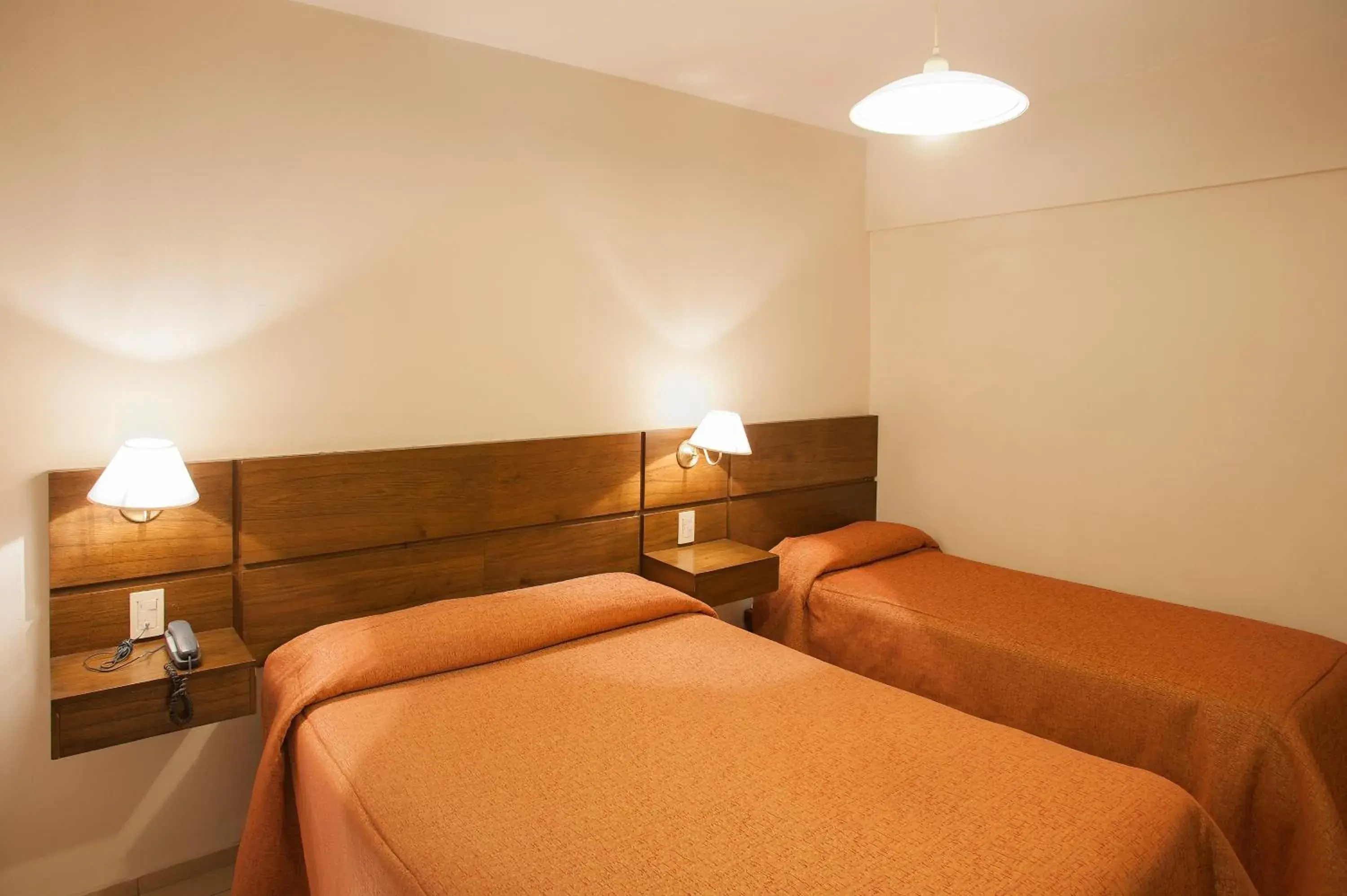 Bed in Hotel Carollo