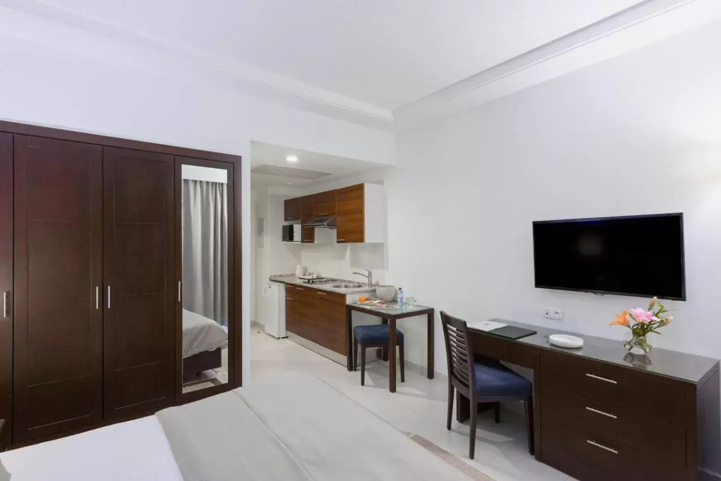 TV/Entertainment Center in Le Corail Suites Hotel