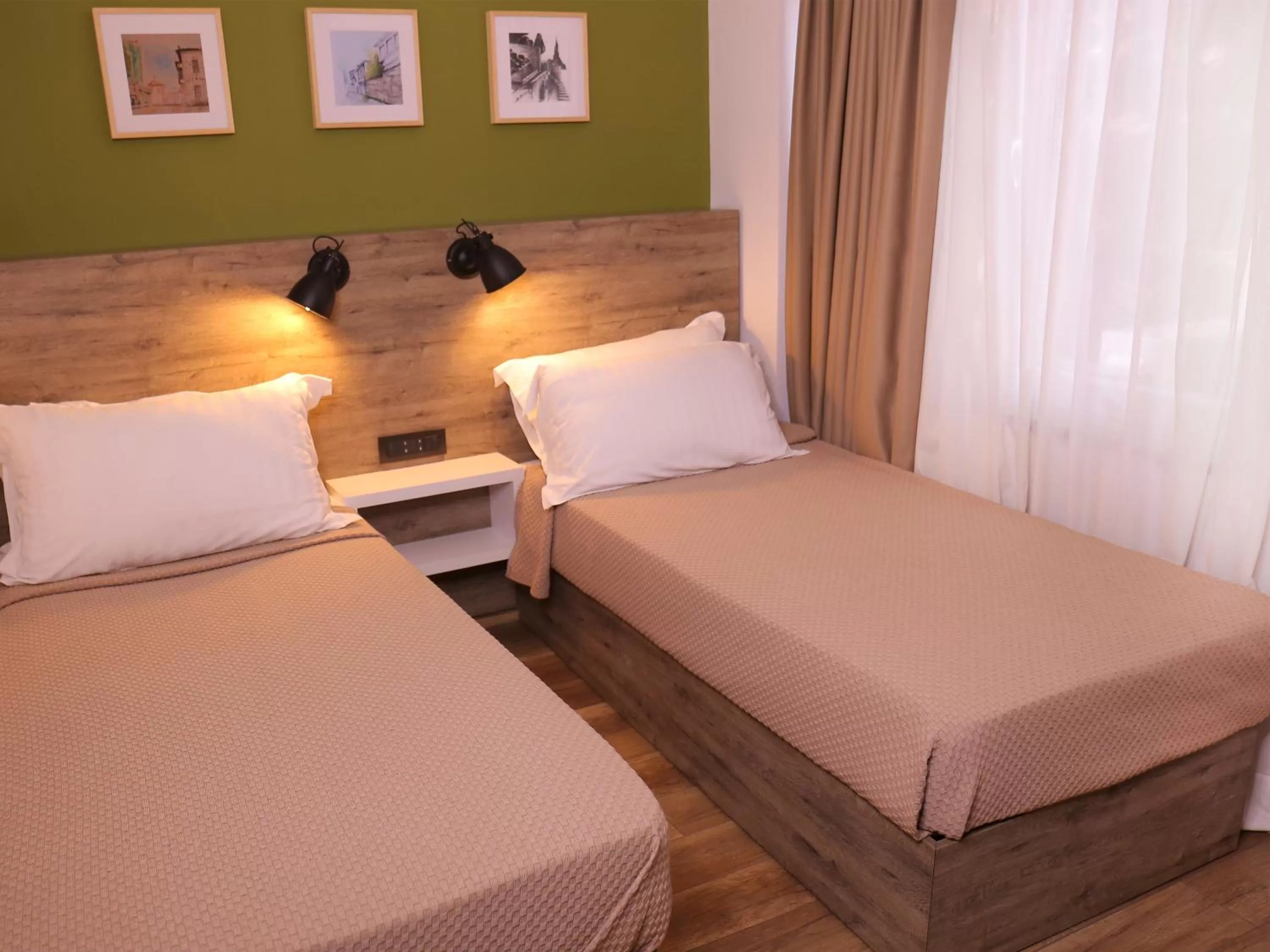 Bed in Oda Hotel Tirana