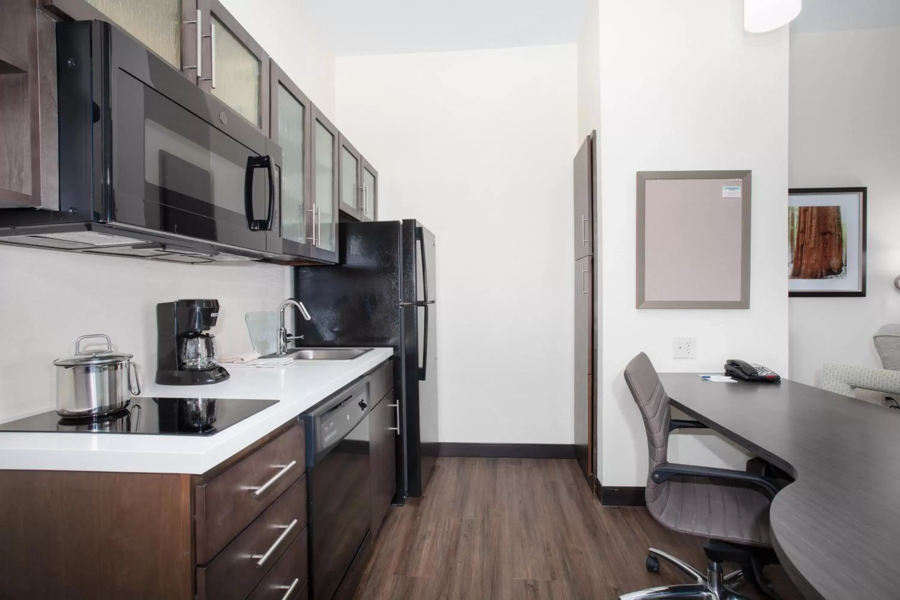 Photo of the whole room, Kitchen/Kitchenette in Candlewood Suites Cheyenne, an IHG Hotel