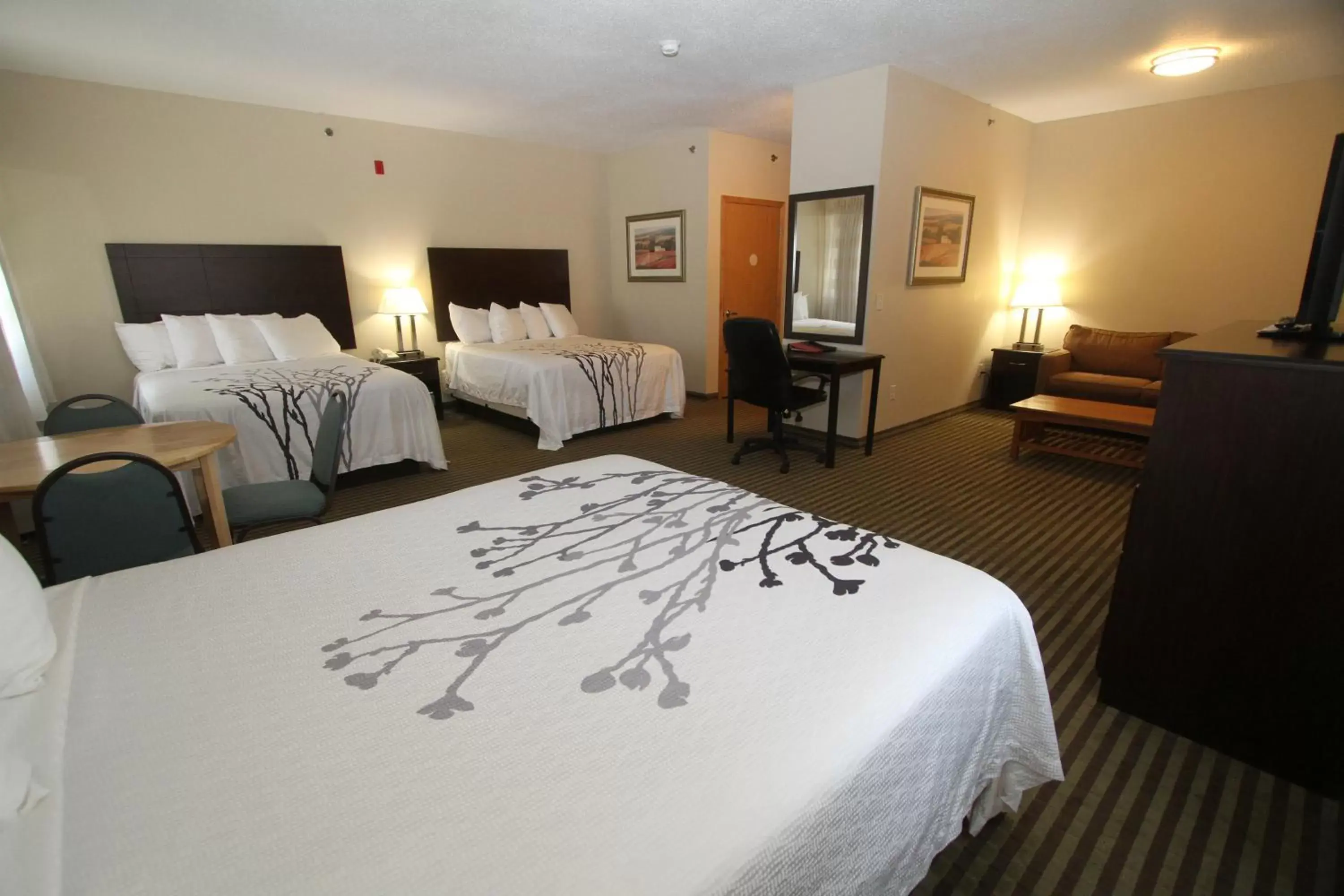 Bed in Bowman Inn and Suites