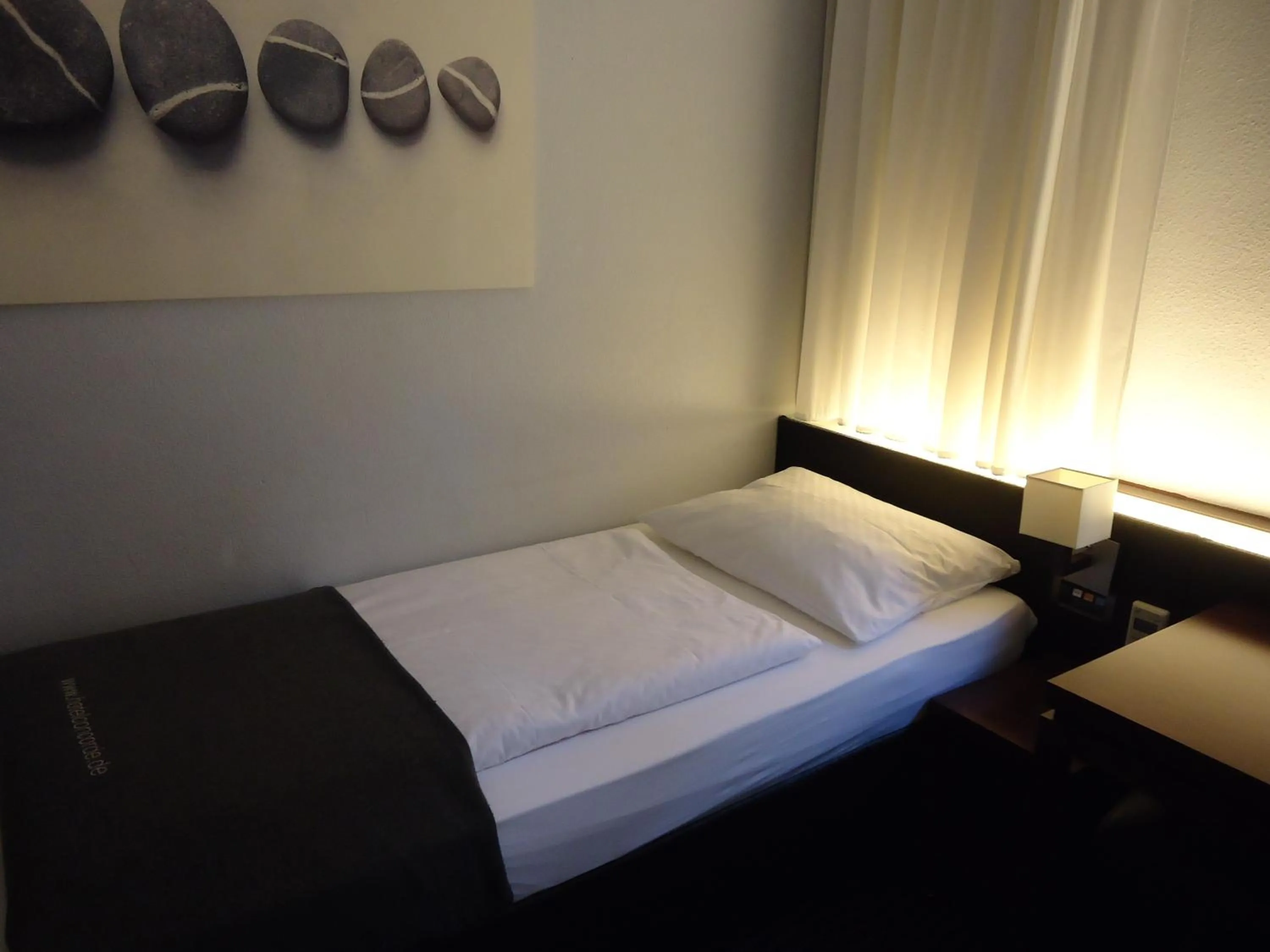 Bed in Hotel Concorde