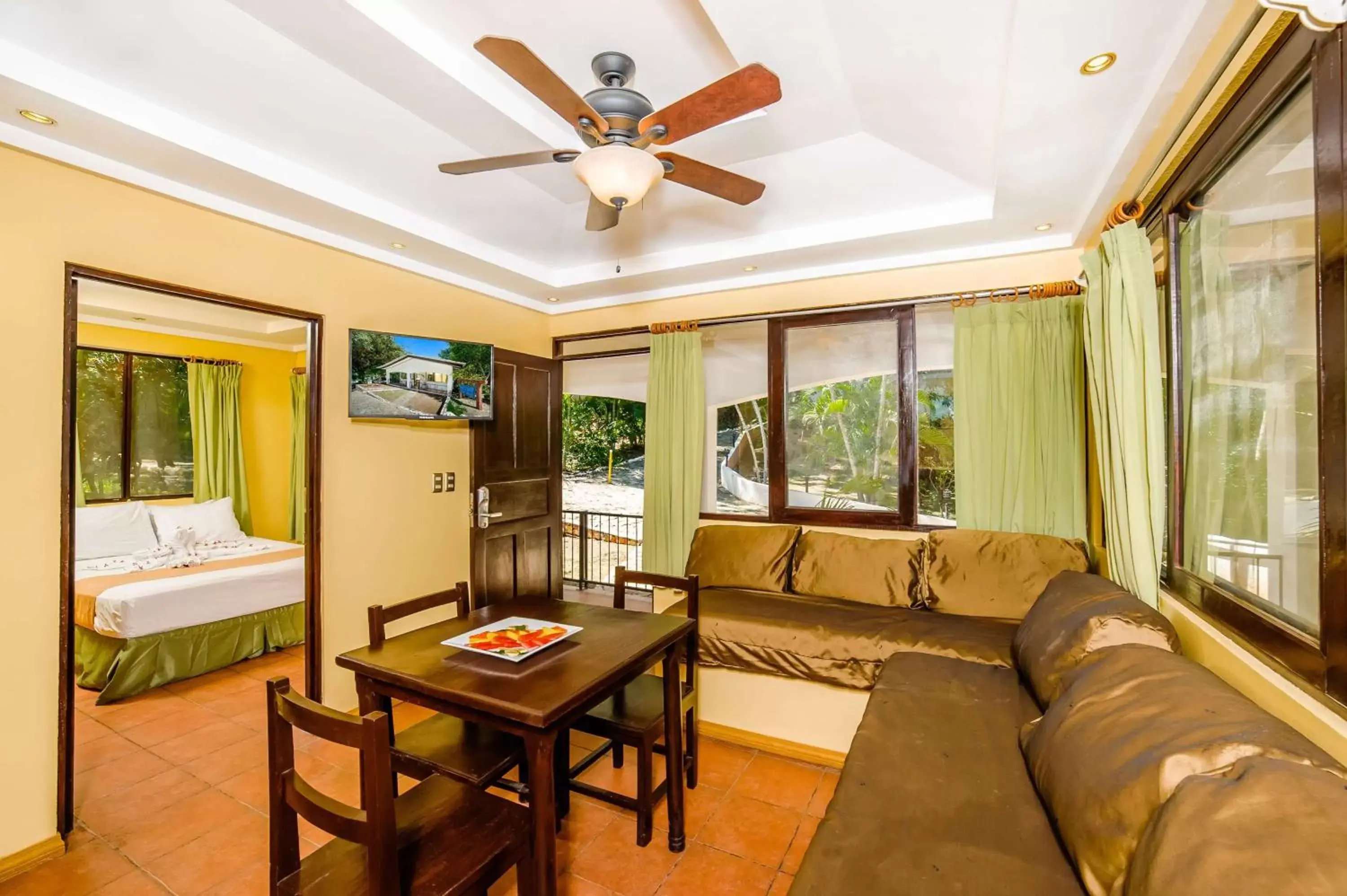 Photo of the whole room, Seating Area in Best Western Tamarindo Vista Villas