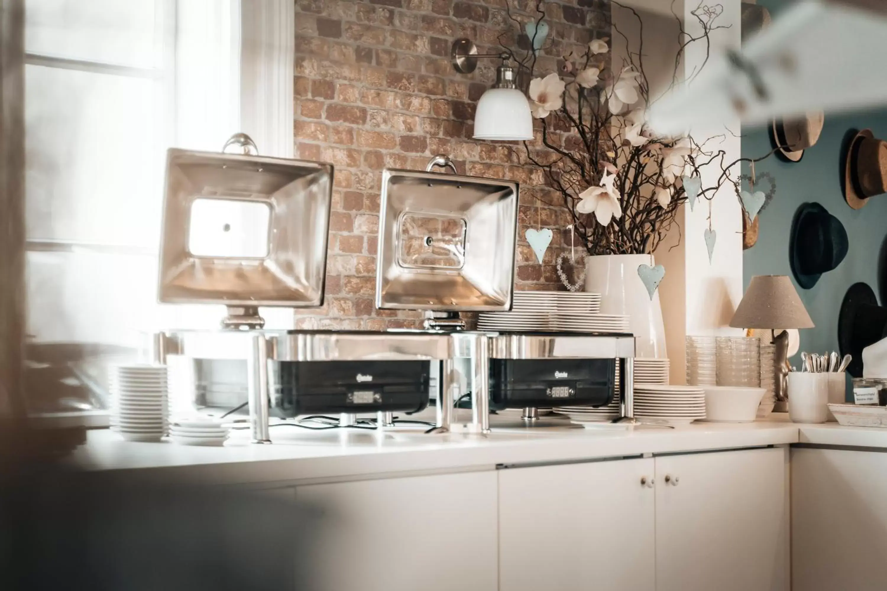 Buffet breakfast, Kitchen/Kitchenette in Hotel Freihof am Roland