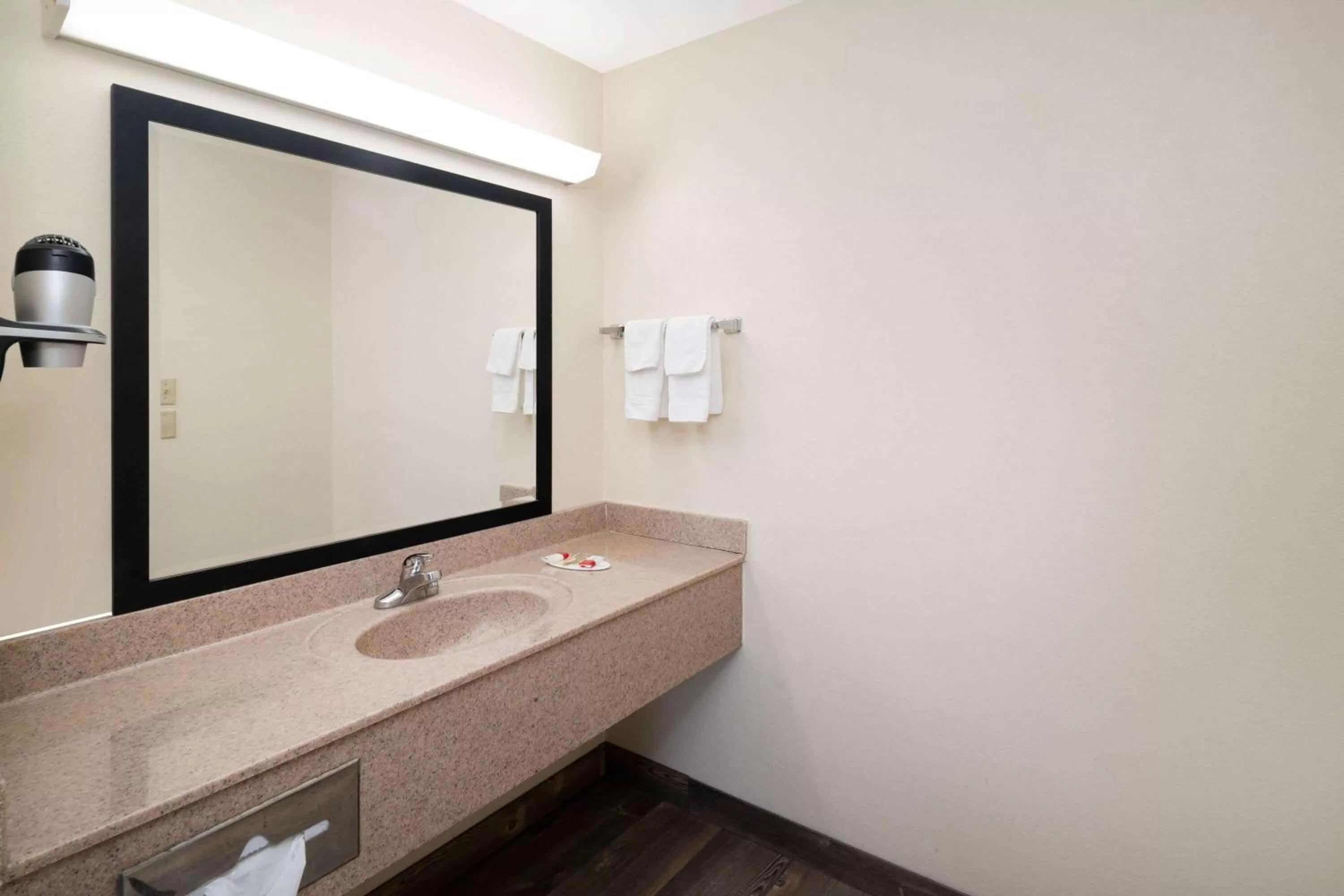 Bathroom in Super 8 by Wyndham Cleveland