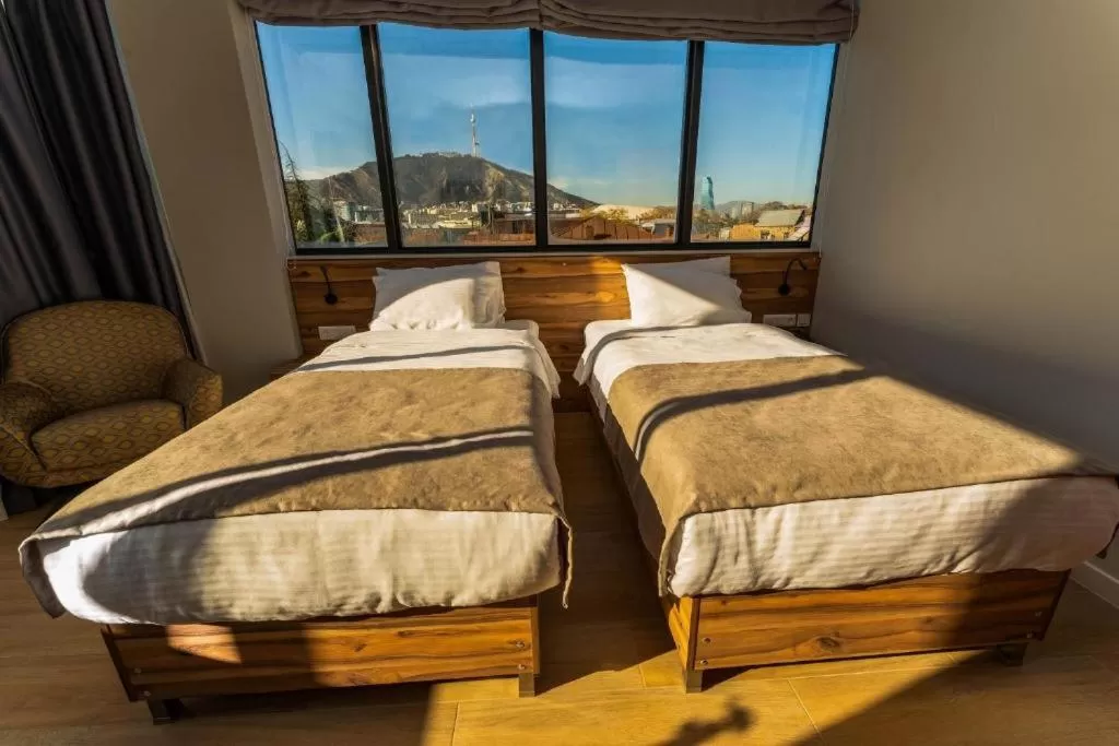 Photo of the whole room, Bed in Address Boutique Hotel