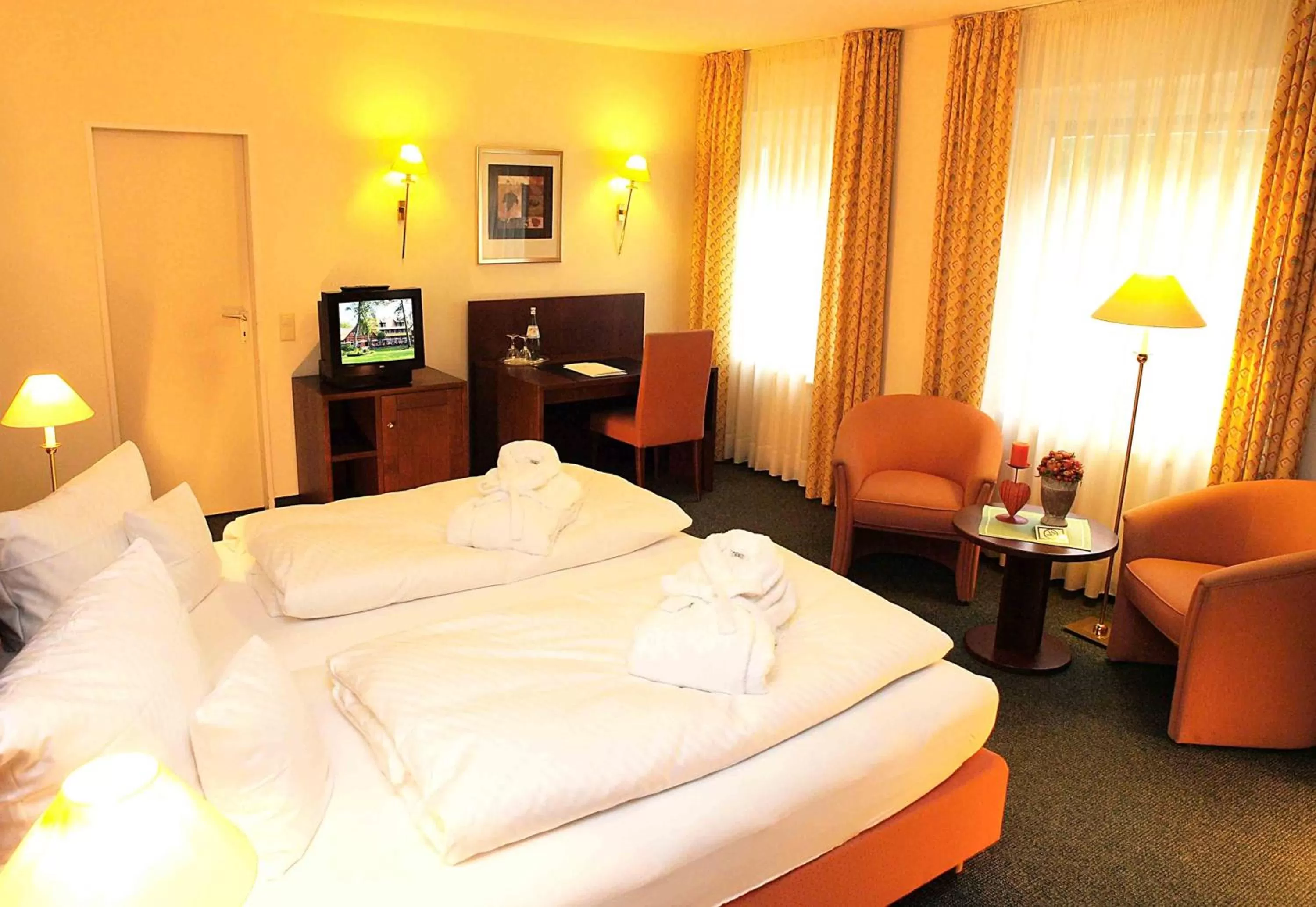 Photo of the whole room, Bed in Heidehotel Waldhütte