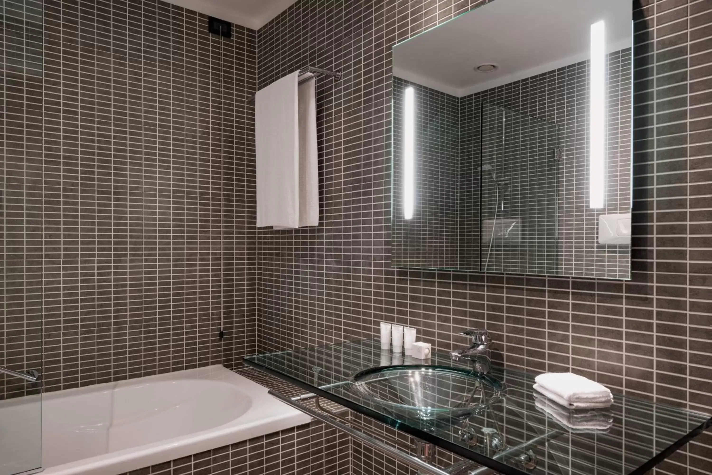 Bathroom in AC Hotel Bologna by Marriott