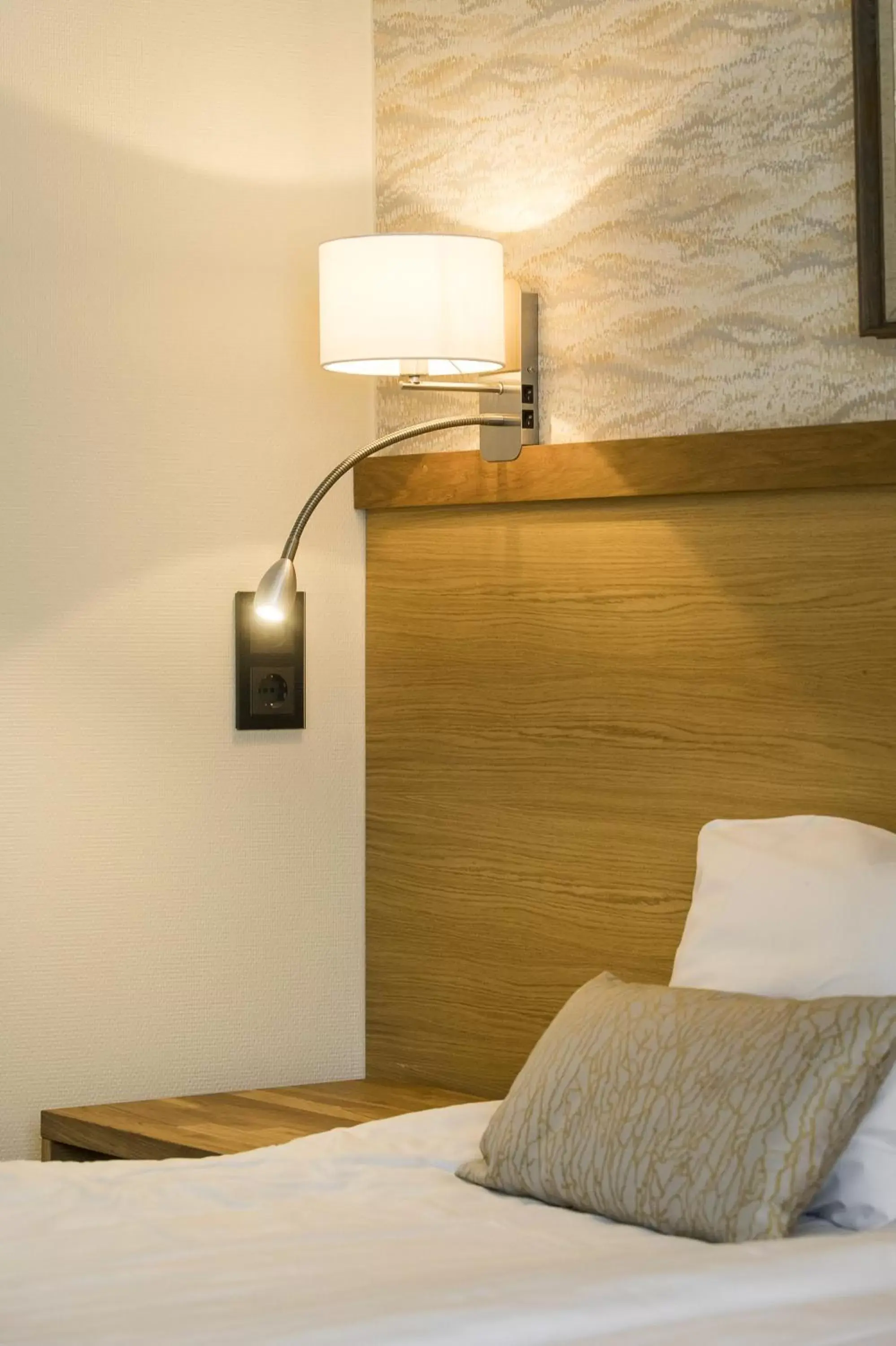 Decorative detail, Bed in Hotel Aakenus