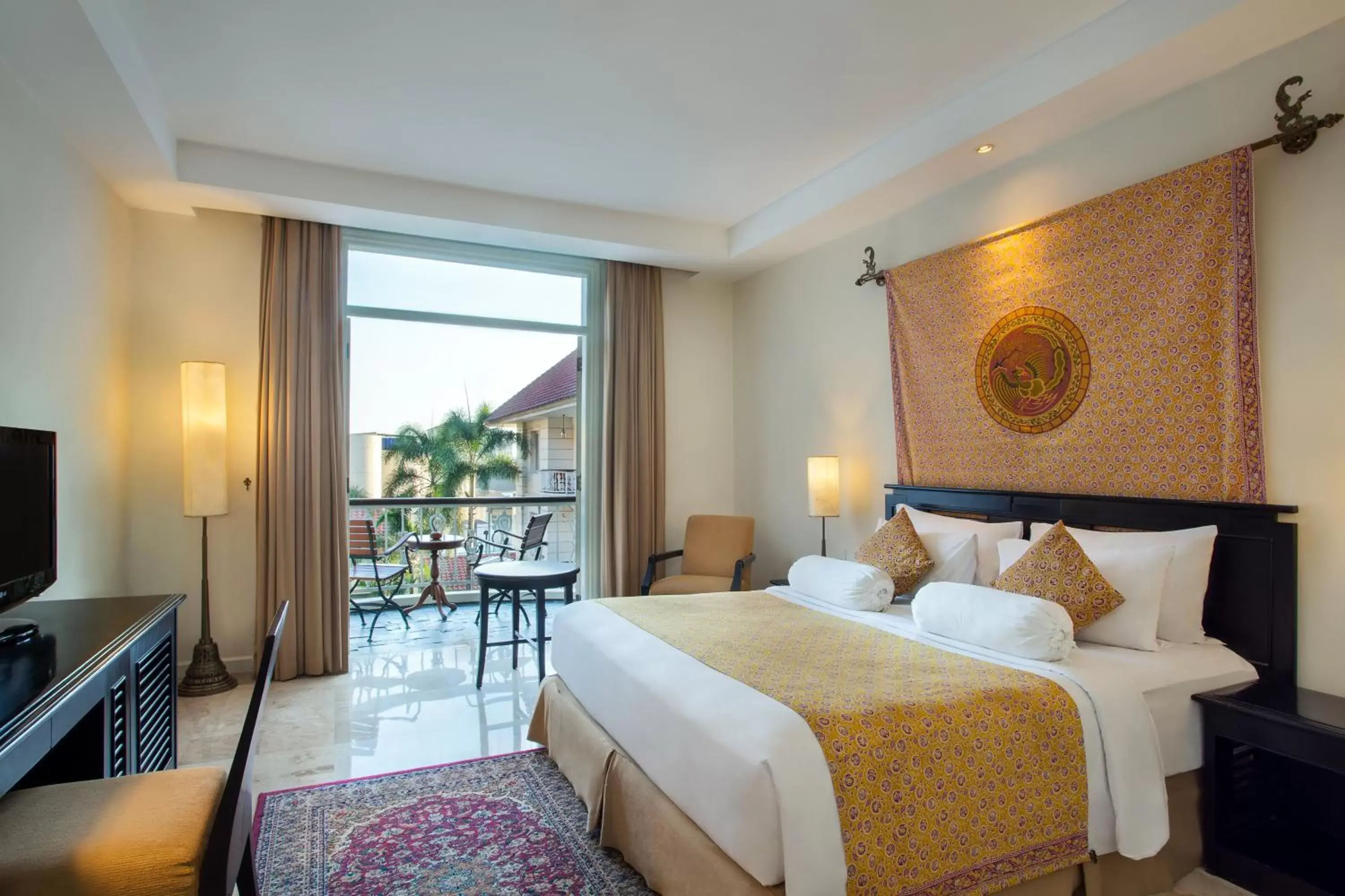 Bed in The Phoenix Hotel Yogyakarta - MGallery Collection