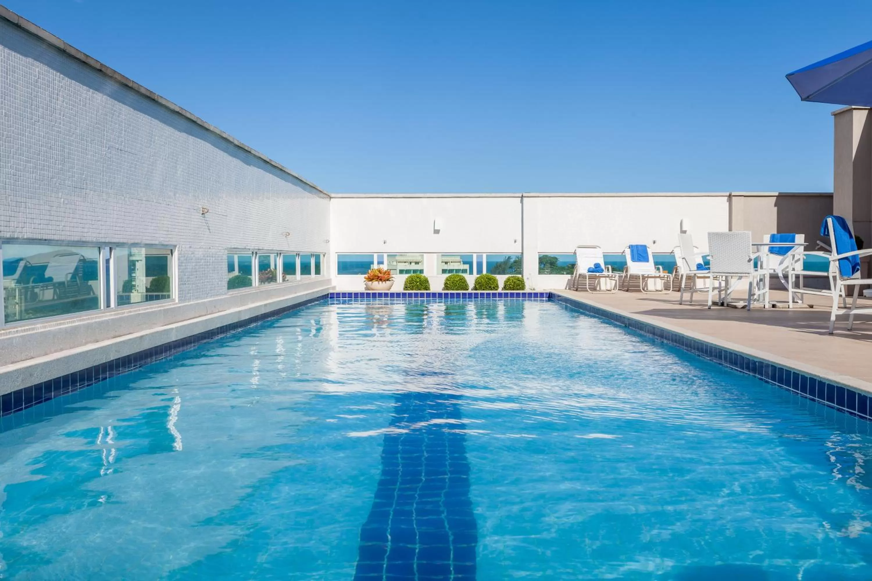 Swimming pool in Ramada by Wyndham Macae Hotel & Suites