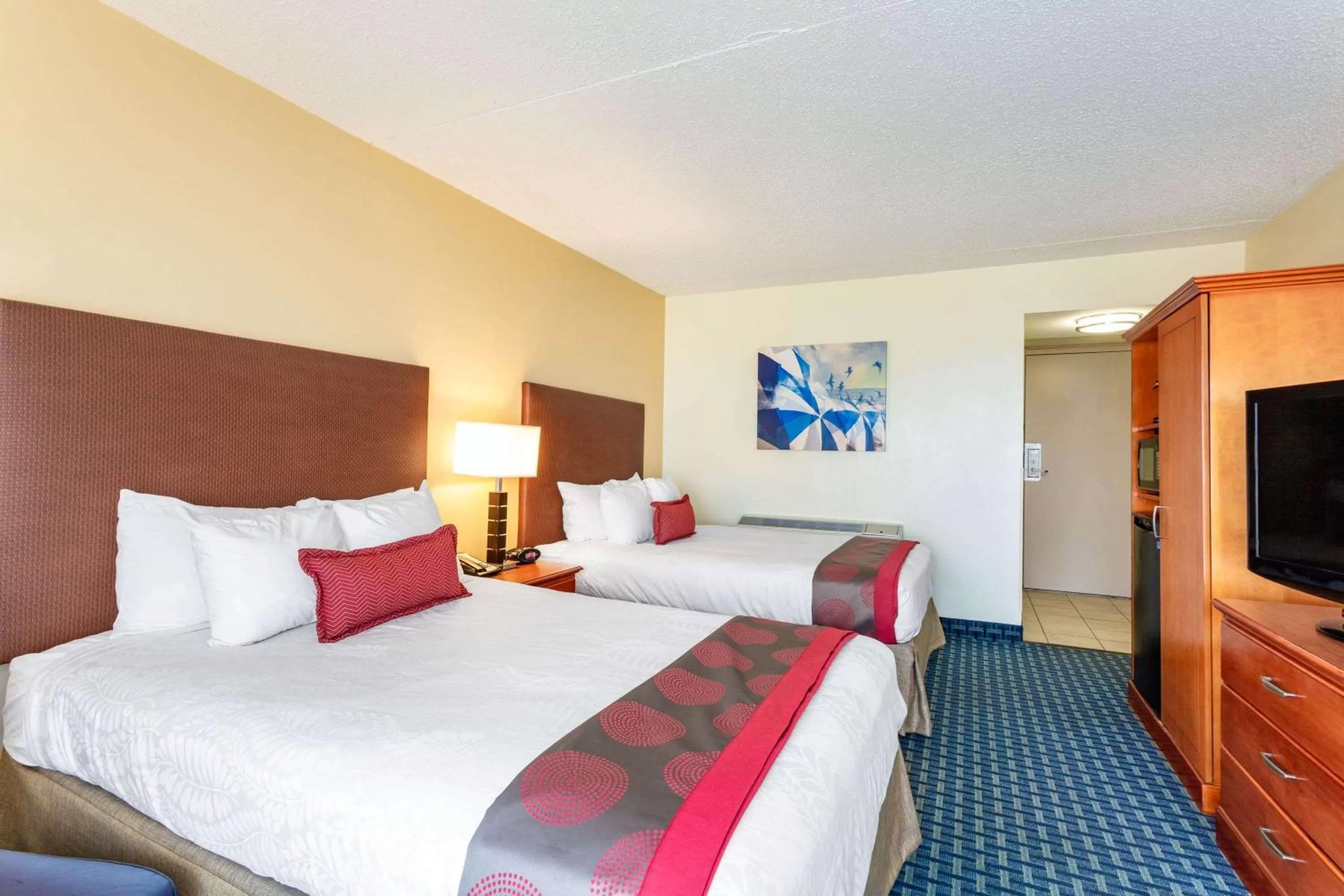 Photo of the whole room, Bed in Ramada Plaza by Wyndham Virginia Beach Oceanfront