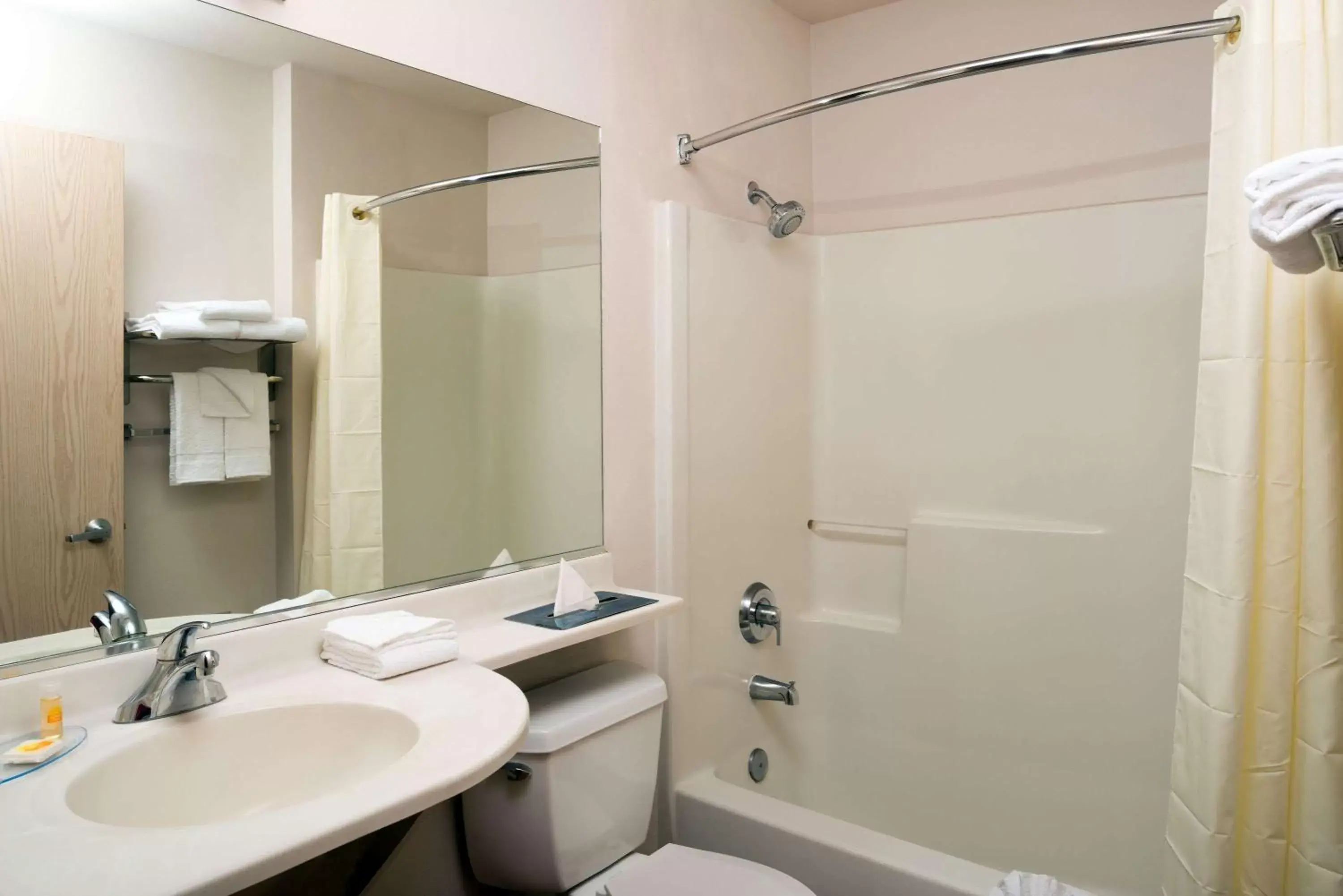 Bathroom in Days Inn & Suites by Wyndham Spokane Airport Airway Heights