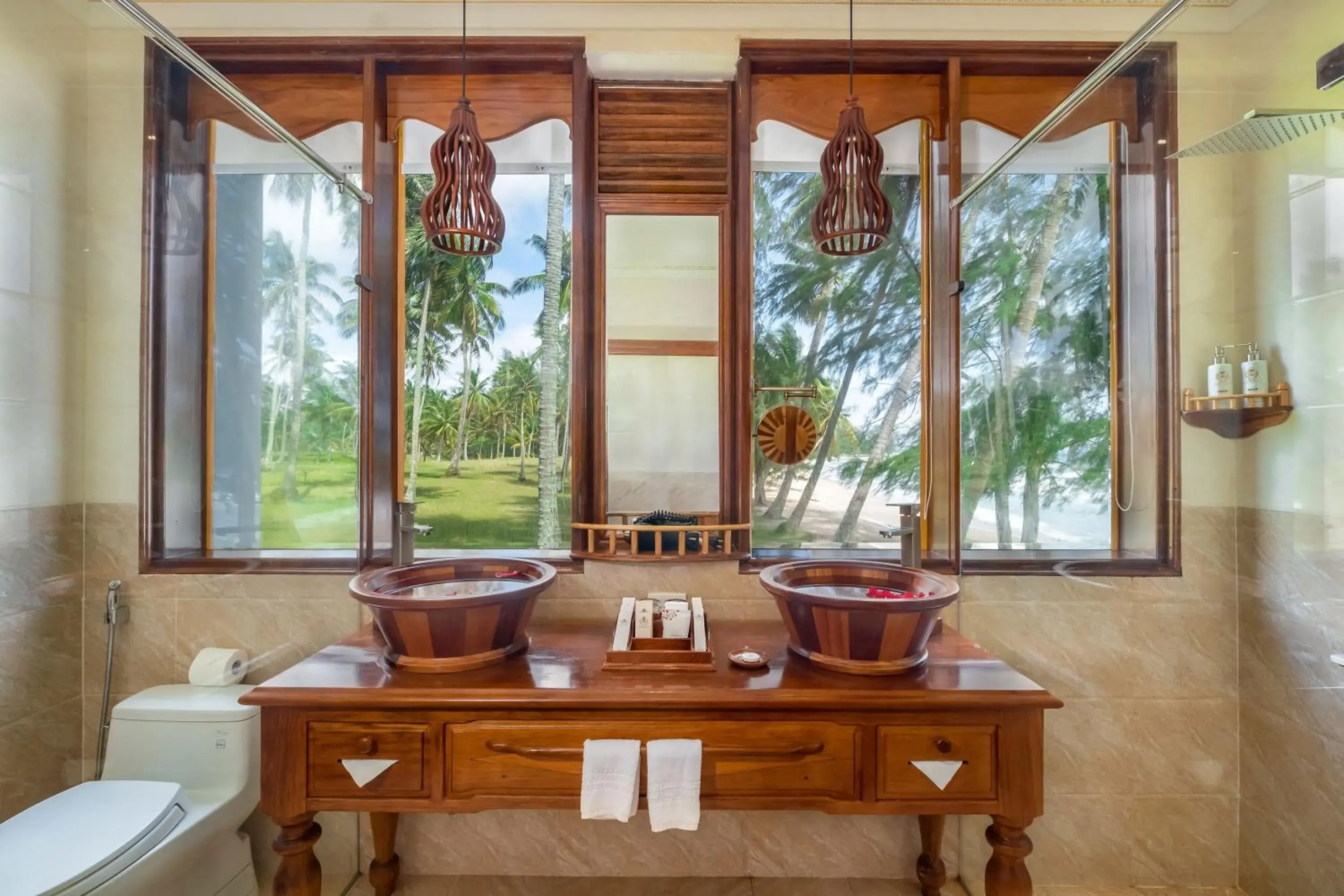 Bathroom in Coco Palm Beach Resort & Spa