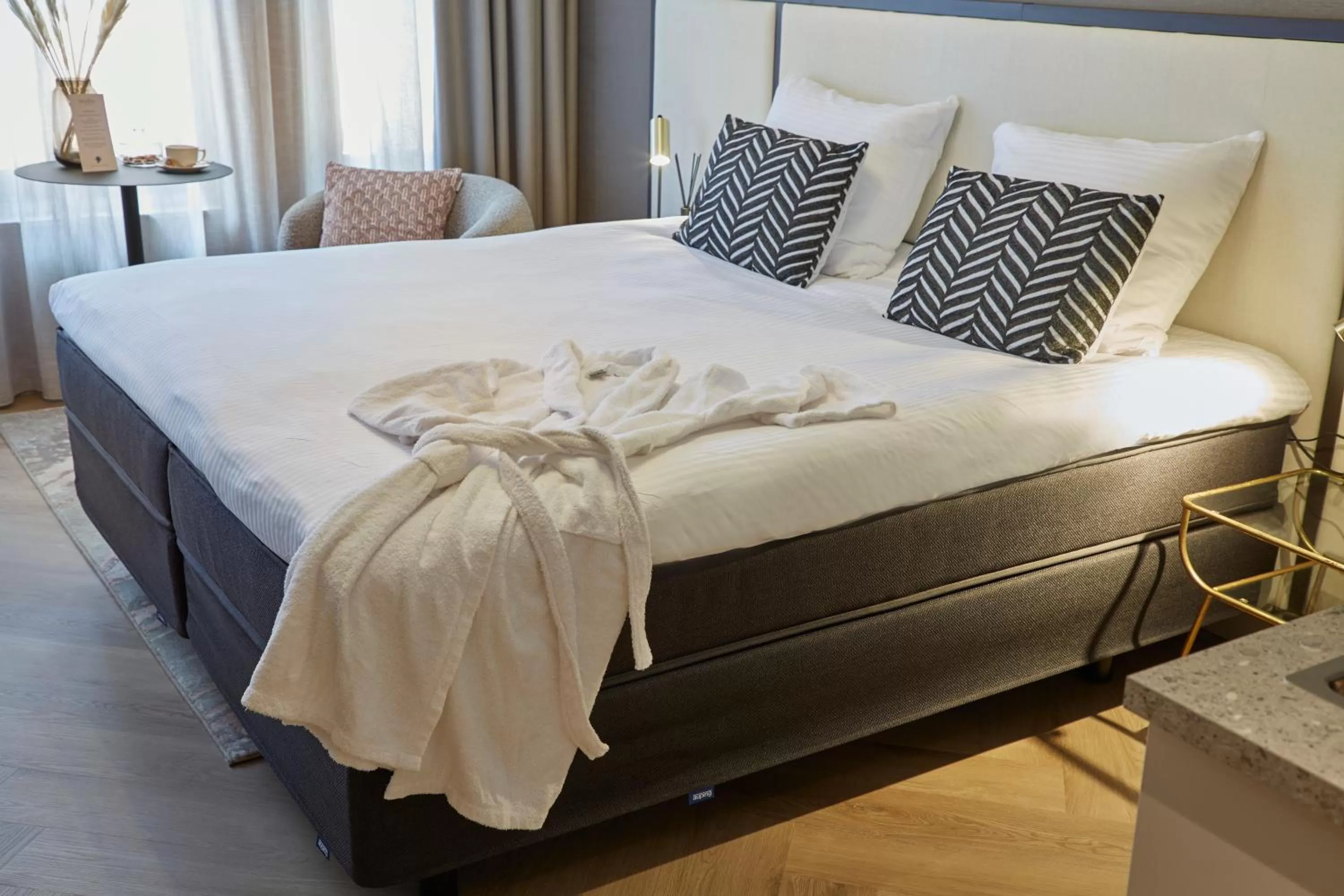 Bed in Breathe Boutique Hotel