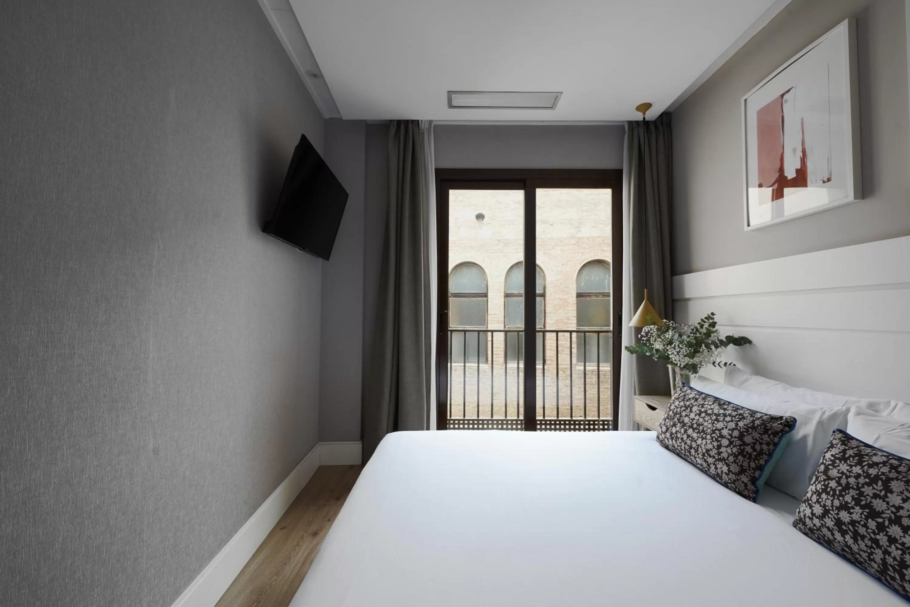 Bed in Numa Barcelona Brio