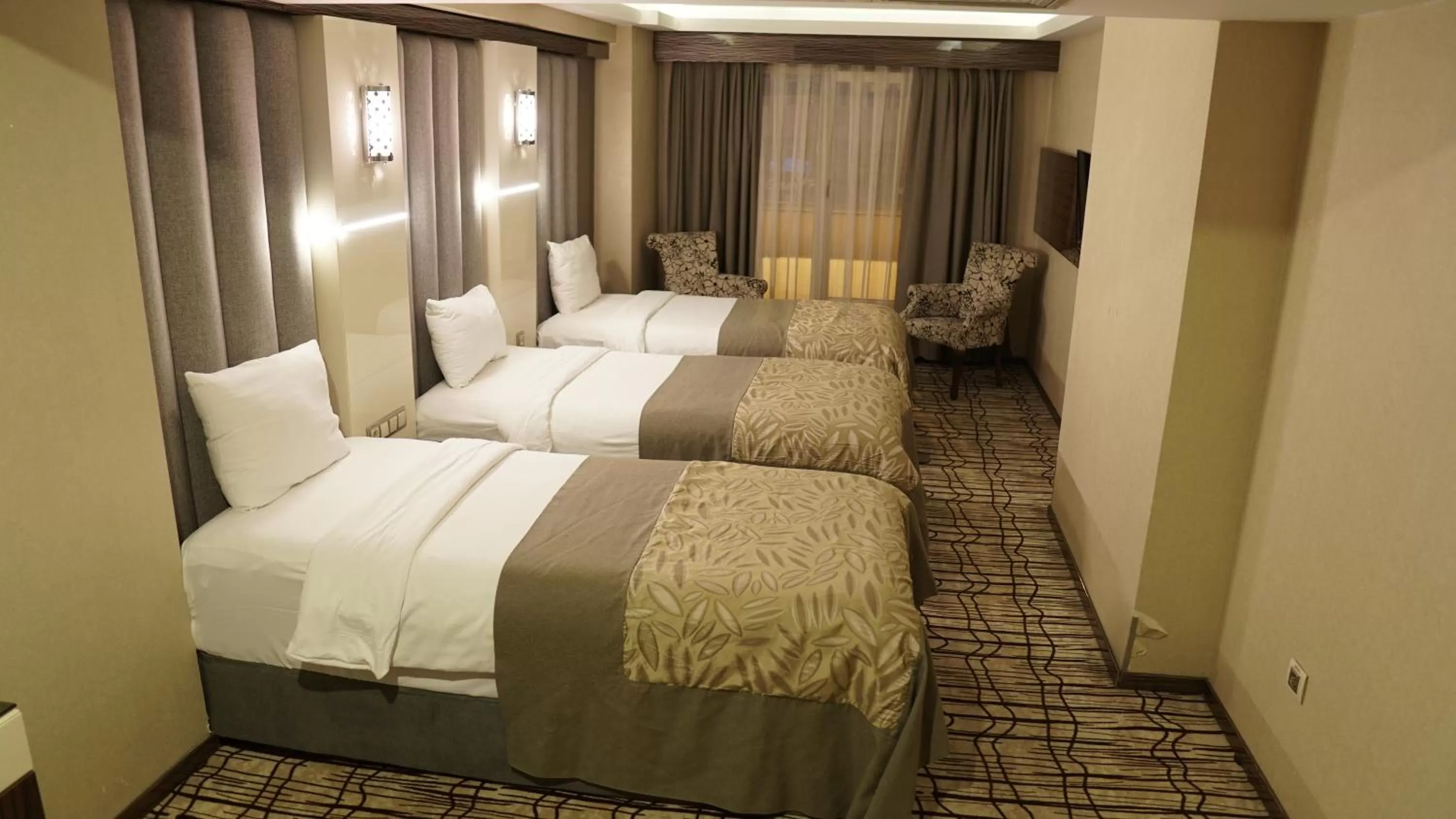 Bed in Green Prusa Hotel