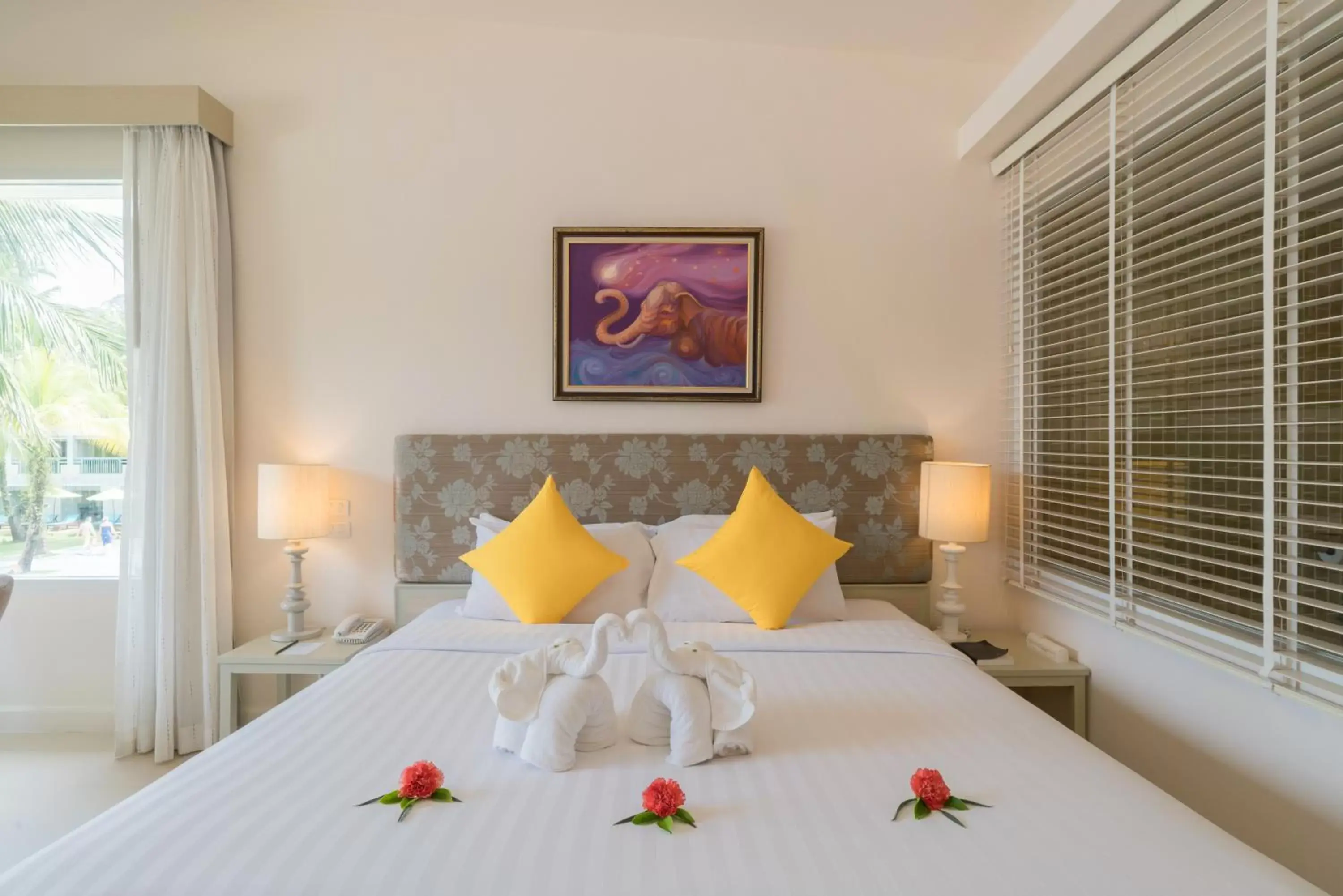 Bed in The Briza Beach Resort, Khao Lak SHA Extra Plus