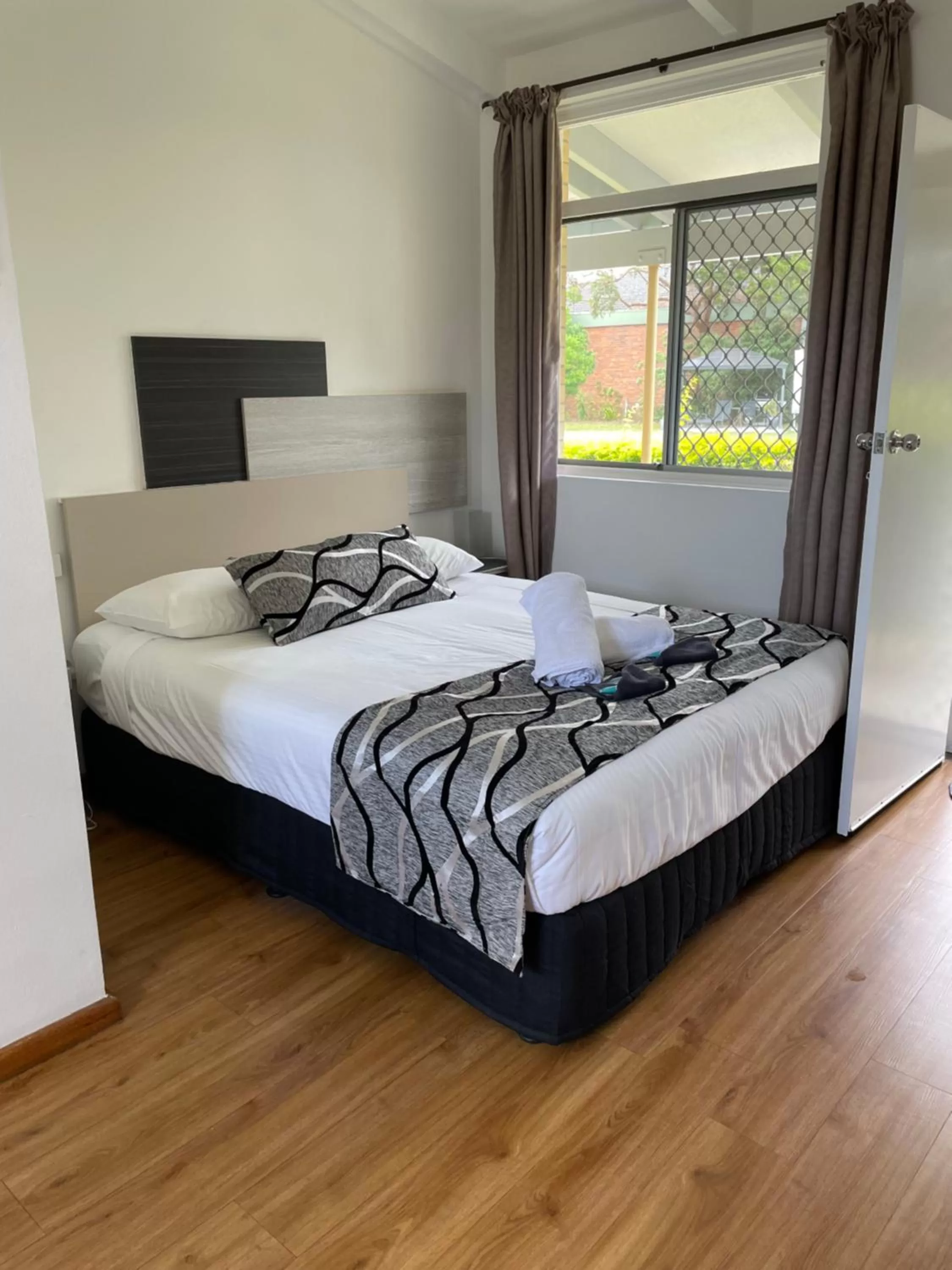 Bed in Forster and Wallis Lake Motel