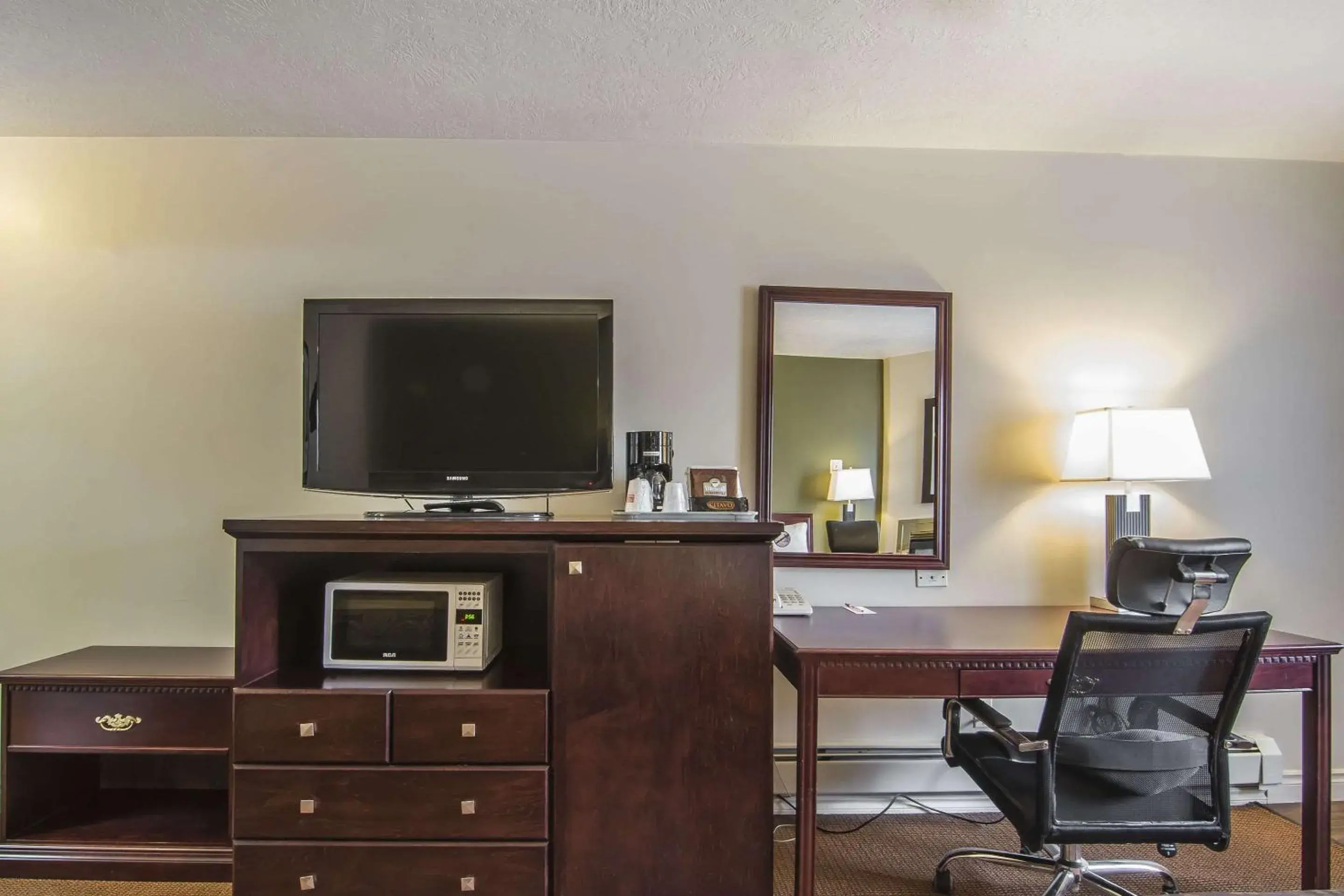 Photo of the whole room, TV/Entertainment Center in Econo Lodge  Inn & Suites