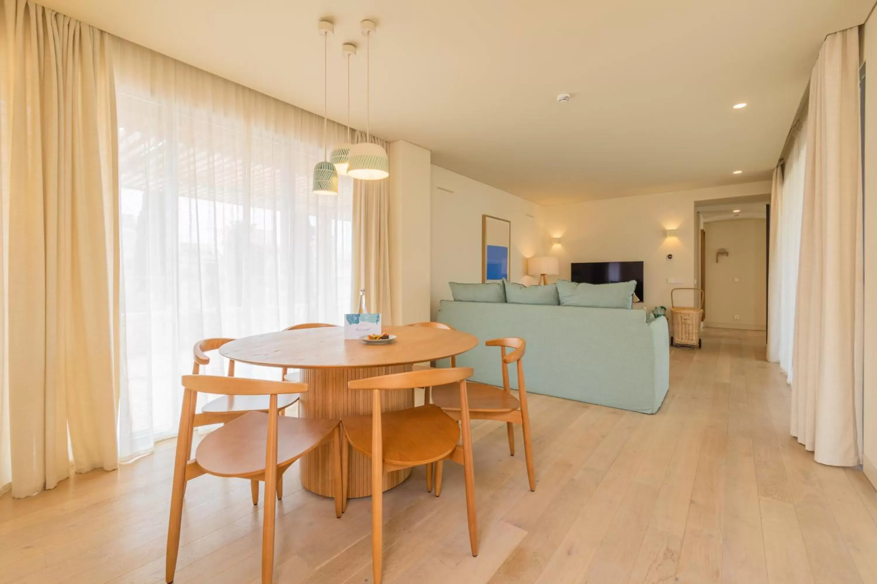 Living room, Dining Area in White Shell Beach Villas